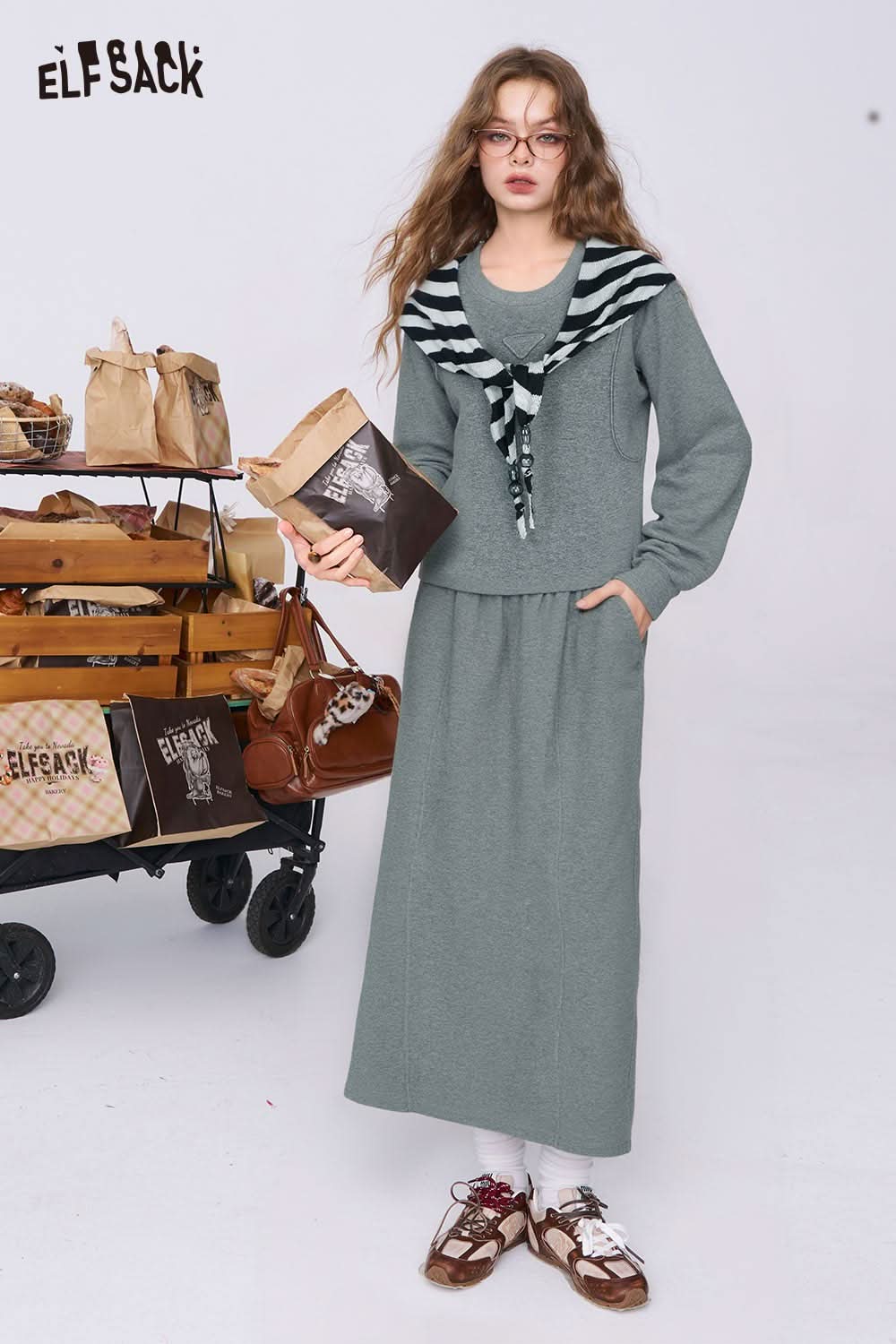 ELFSACK cotton blend two-piece set for women featuring a cozy sweater and matching skirt in green