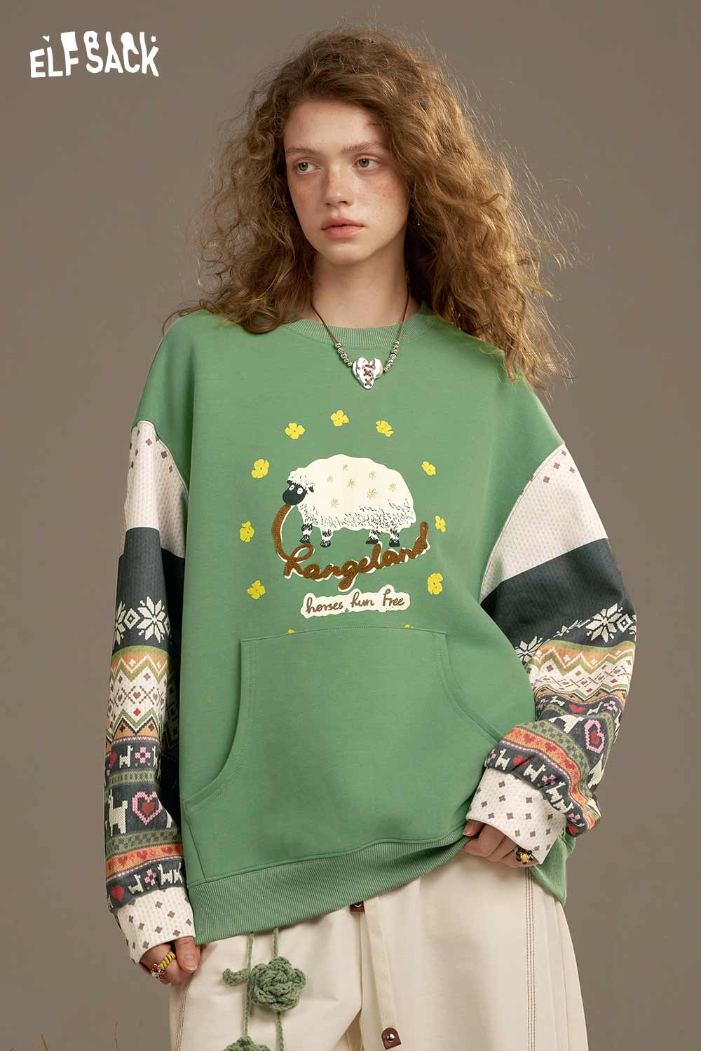 ELFSACK vintage splicing crew neck sweatshirt in green with colorful patterned sleeves and a graphic design