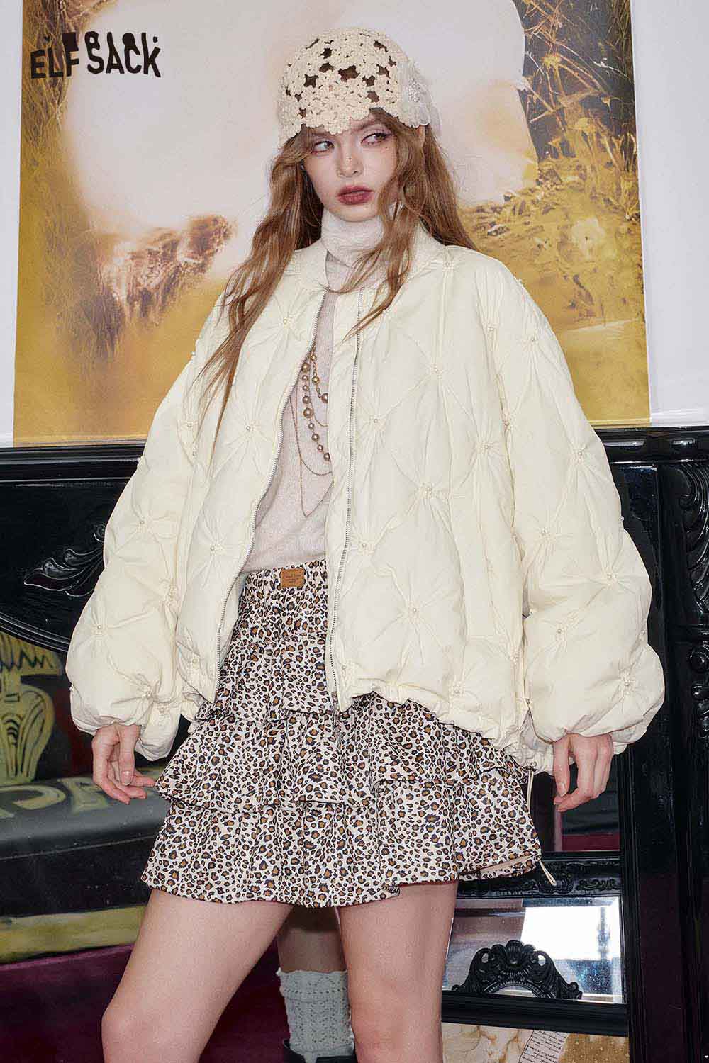 ELFSACK cream quilted mid-length jacket with stylish puffed sleeves for a trendy winter look