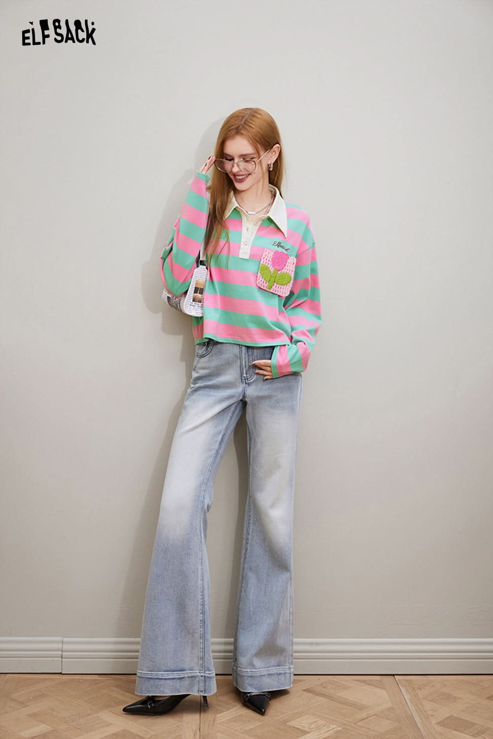 ELFSACK Croche Flower Striped long sleeve polo T-shirt in pink and green worn with light blue wide-leg jeans