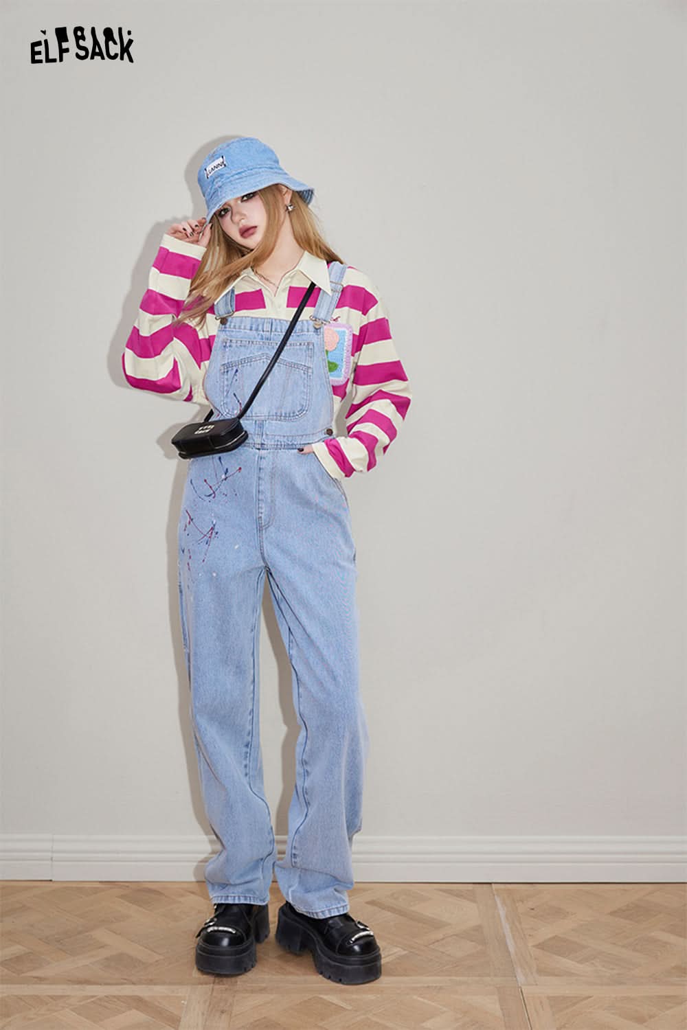 ELFSACK Croche Flower Striped long sleeve t-shirt worn with denim overalls and bucket hat