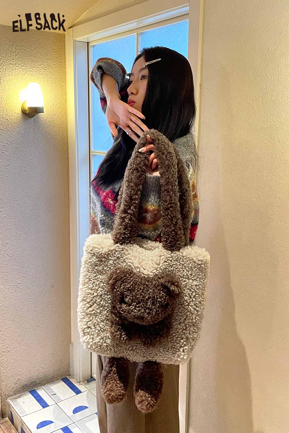 Trendy girl holding a cute 3D bear shoulder bag made of soft material, perfect for casual outings.