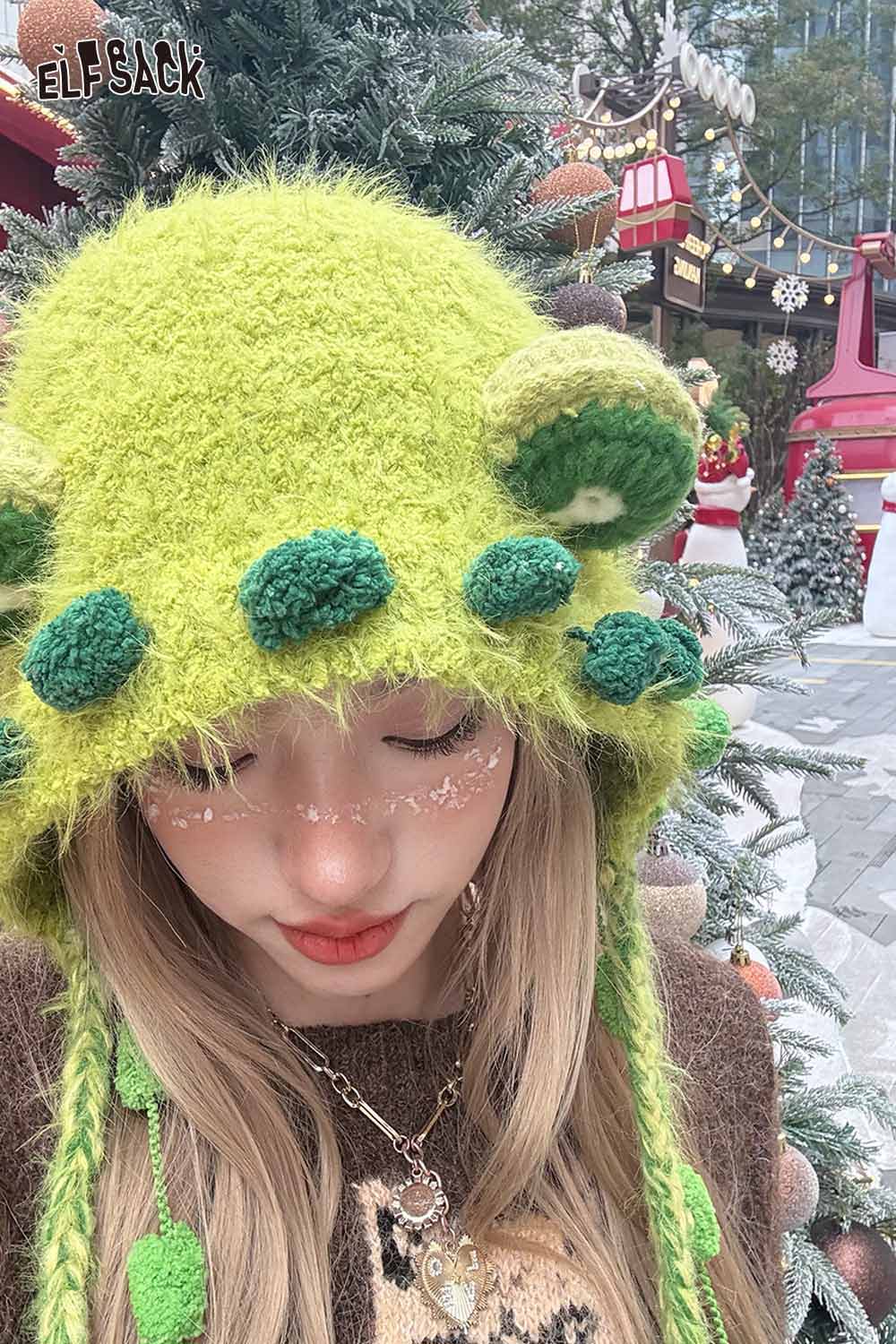 ELFSACK cute 3D ear beanie hat in vibrant green with pom-pom accents for a playful winter look