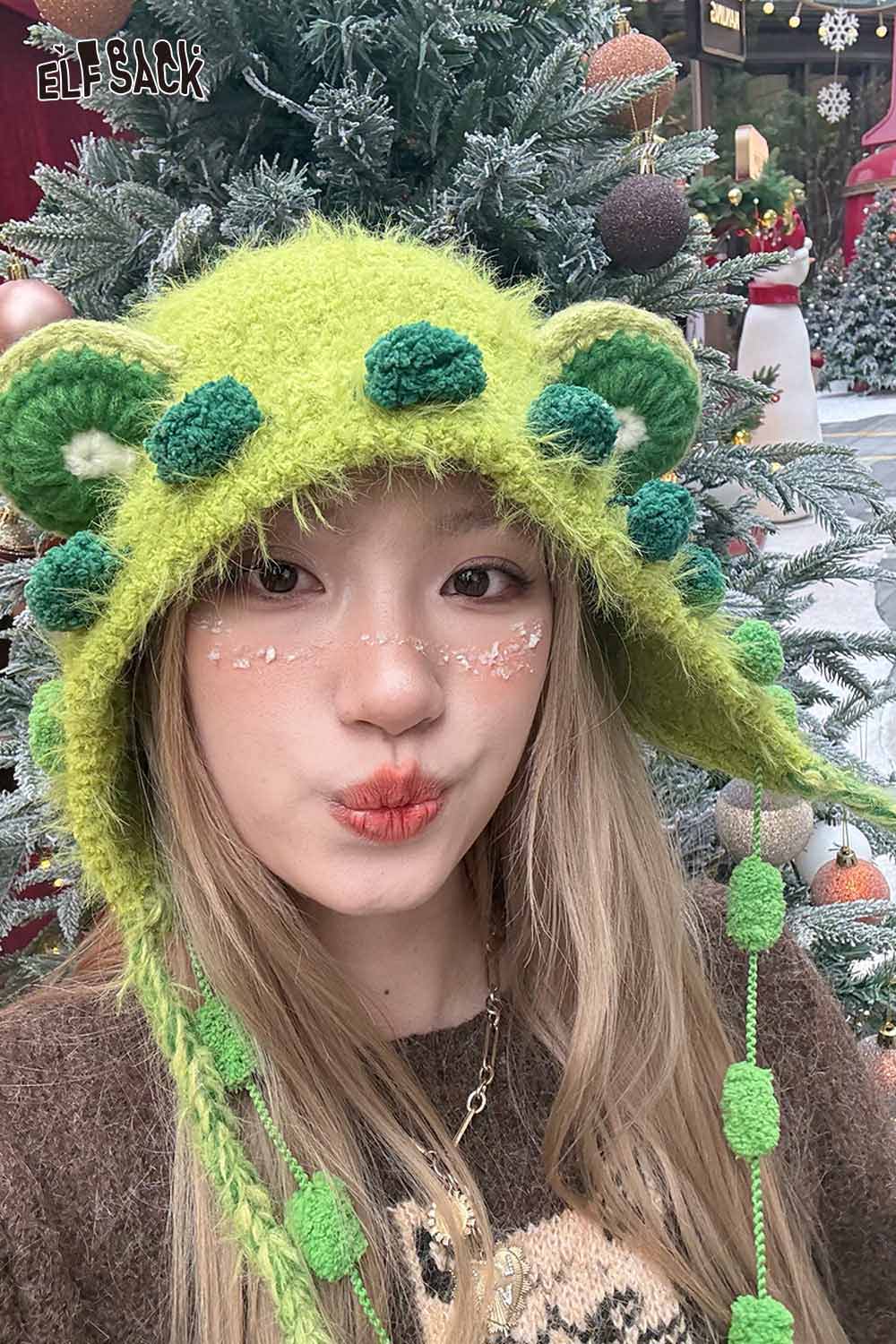 Cute 3D ear beanie hat in green with pom-pom accents for cozy winter style