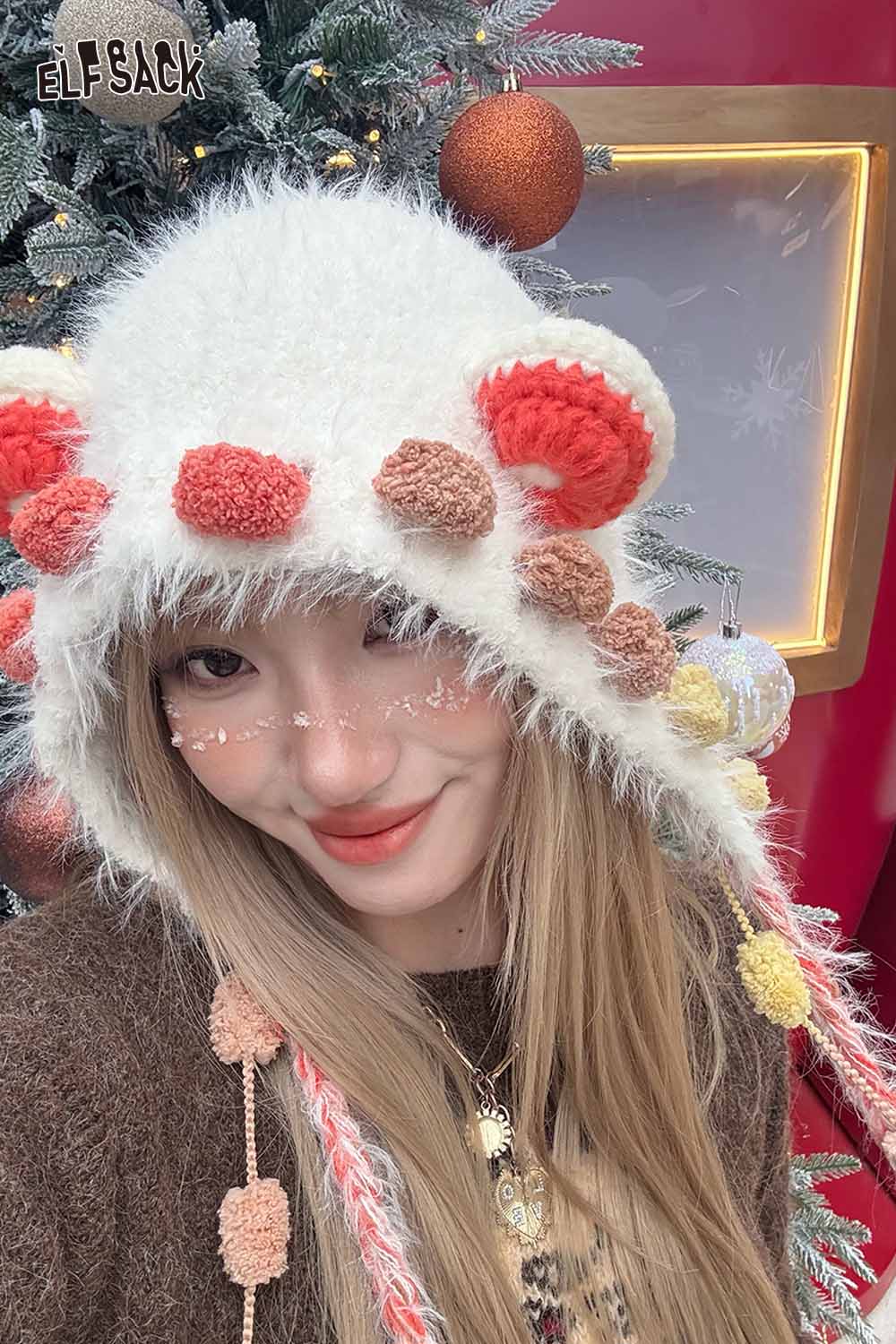 Cute 3D ear beanie hat by ELFSACK with vibrant pom poms and cozy design for winter fashion