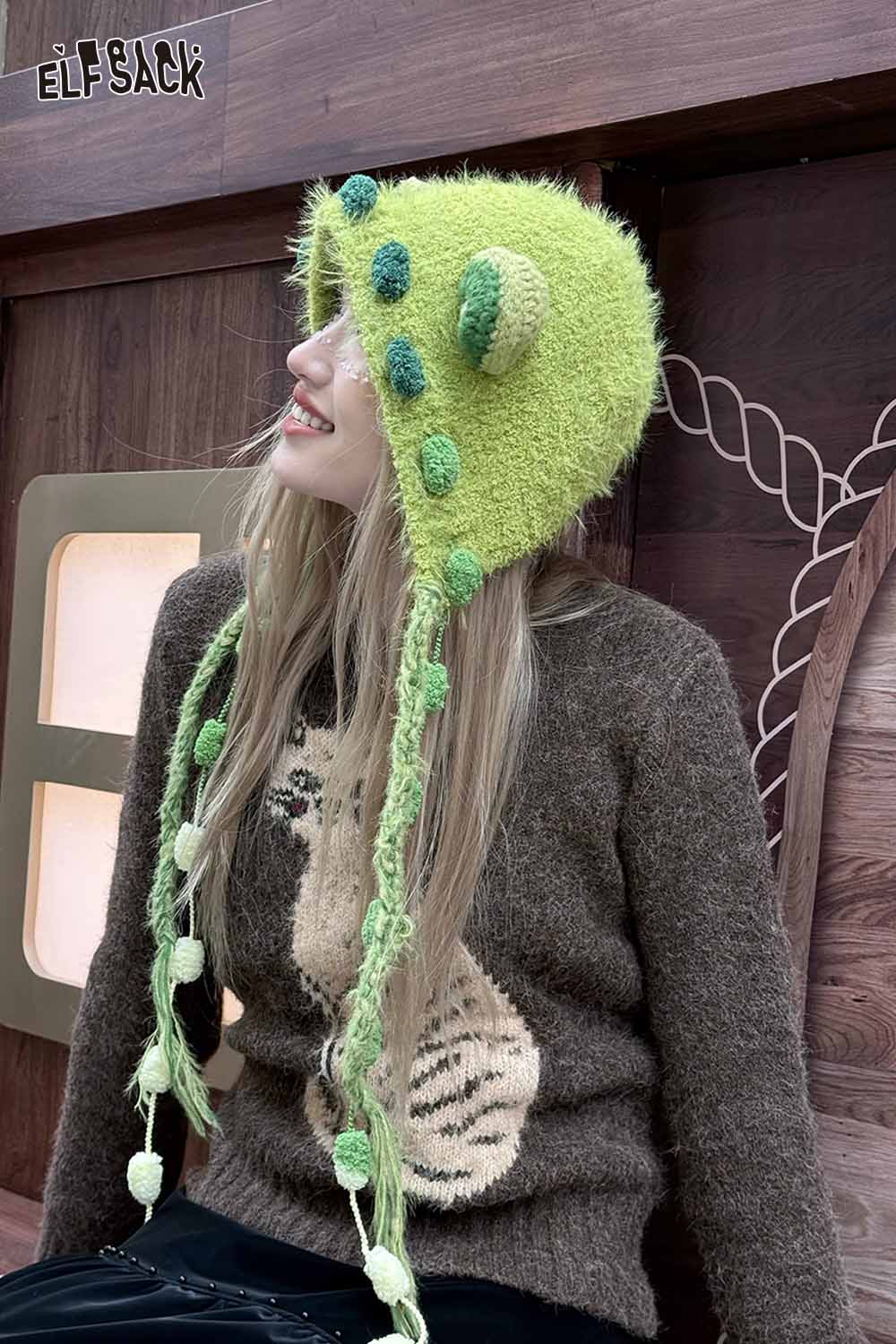 ELFSACK cute 3D ear beanie hat in vibrant green with playful pom-poms and long tassels for a fun winter look