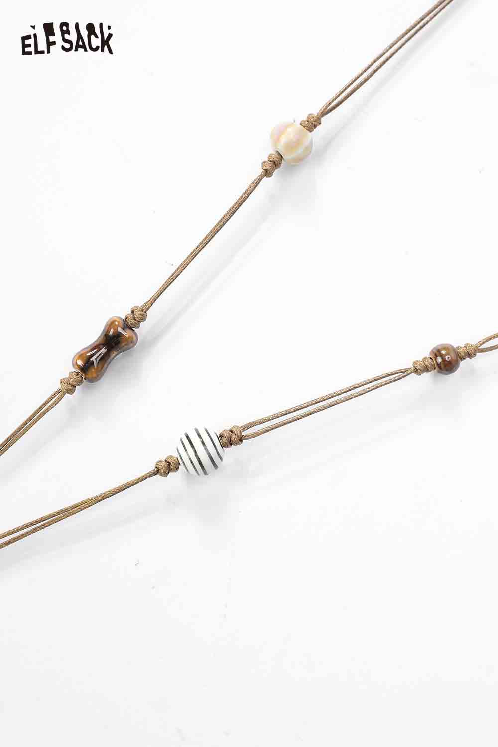 ELFSACK cute dog pendant necklace with assorted beads and a playful design