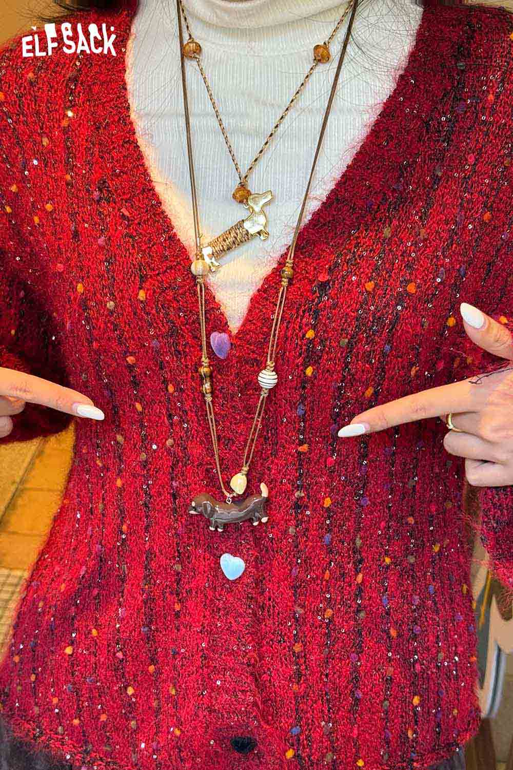 ELFSACK cute dog pendant necklace layered over a cozy red sweater for a stylish look