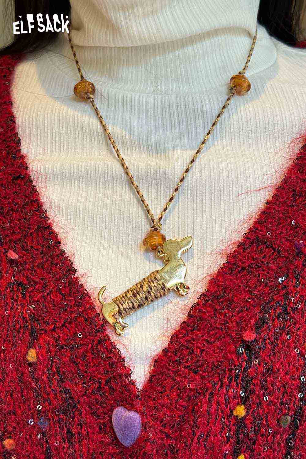 ELFSACK cute dog pendant necklace with unique design and vibrant colors worn on a sweater