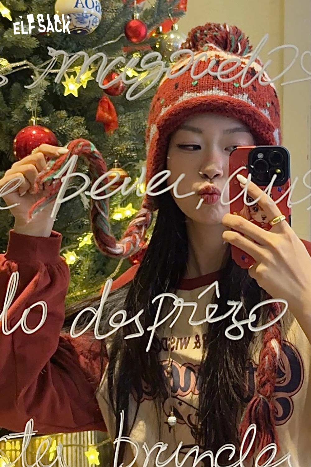 Model wearing a cute Fair Isle knit beanie with colorful patterns and pom-pom by ELFSACK