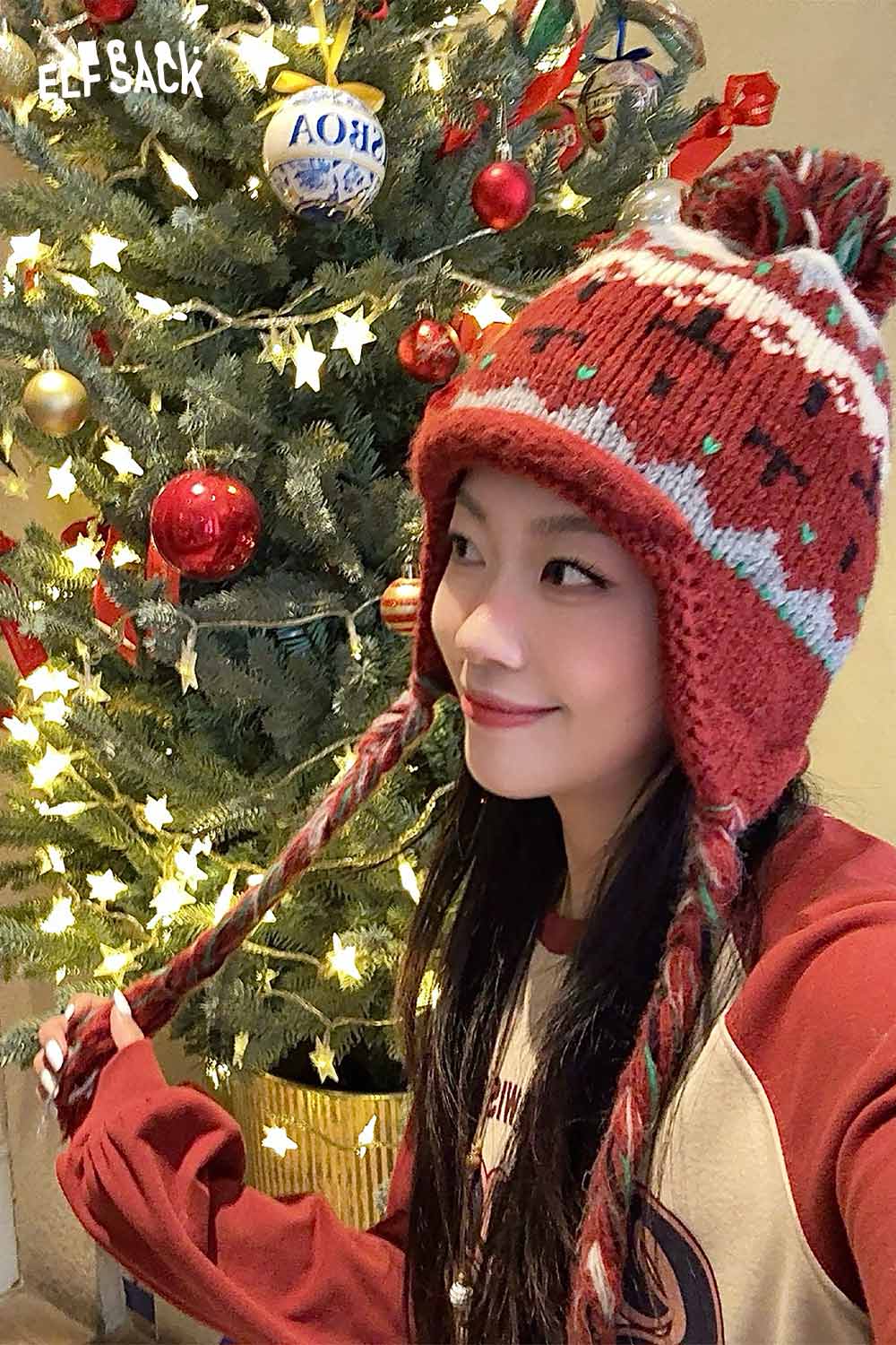 Cute Fair Isle knit beanie in red with pom pom, perfect for winter fashion and holiday cheer