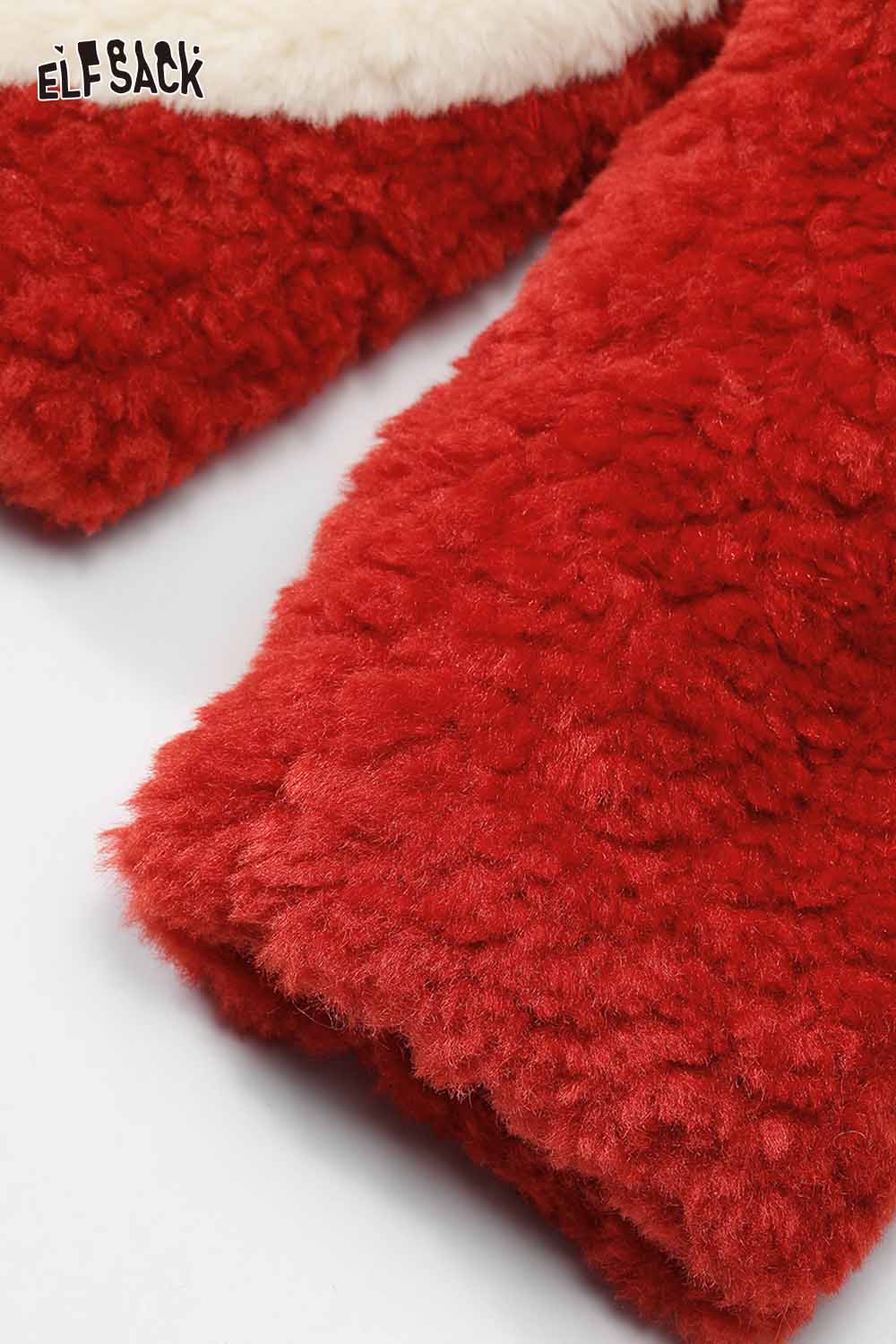 Close-up of a cozy red ELFSACK cute faux wool jacket for women with fluffy texture and warm fabric