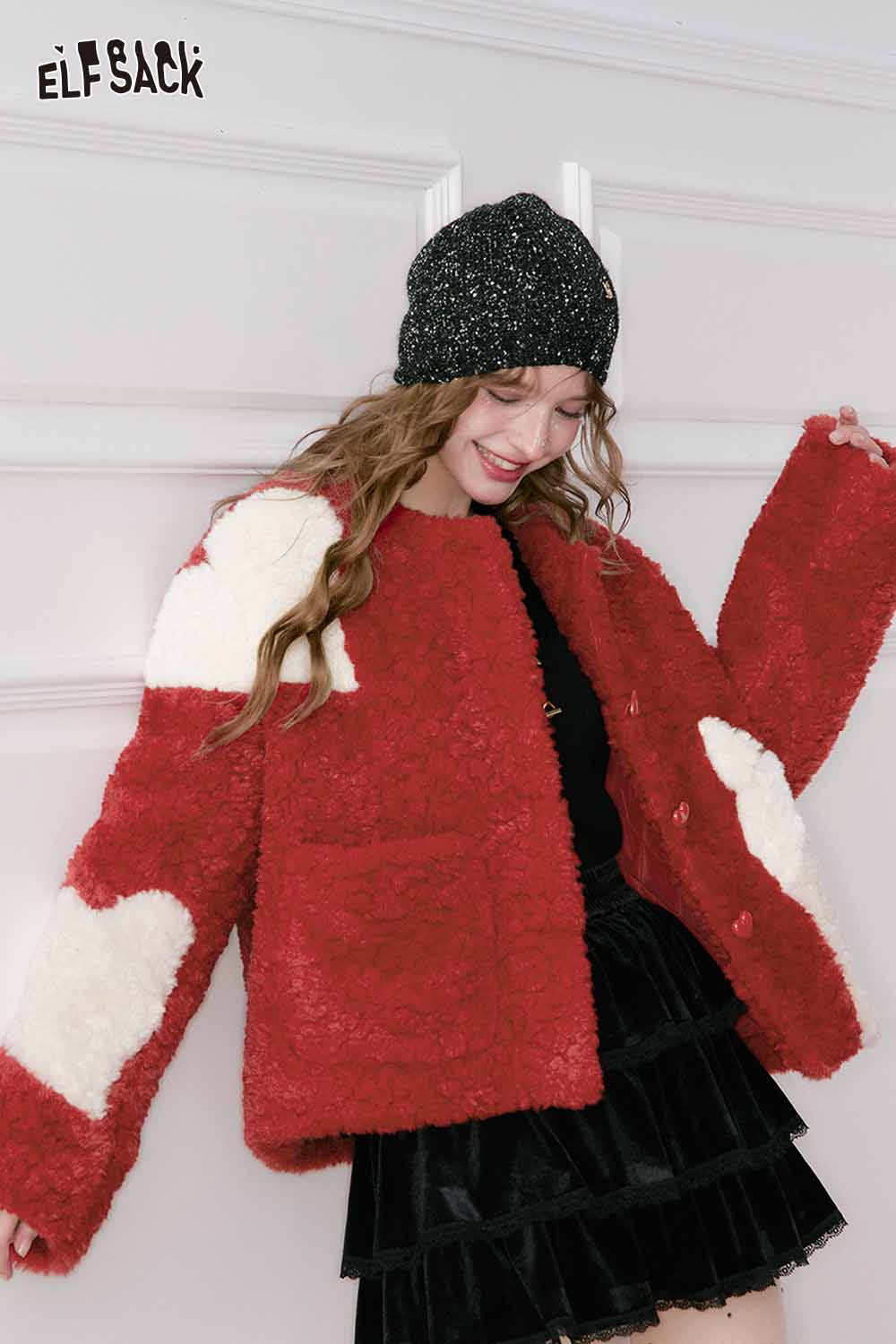 Cute faux wool jacket for women in red with white heart patterns, perfect for trendy winter outfits