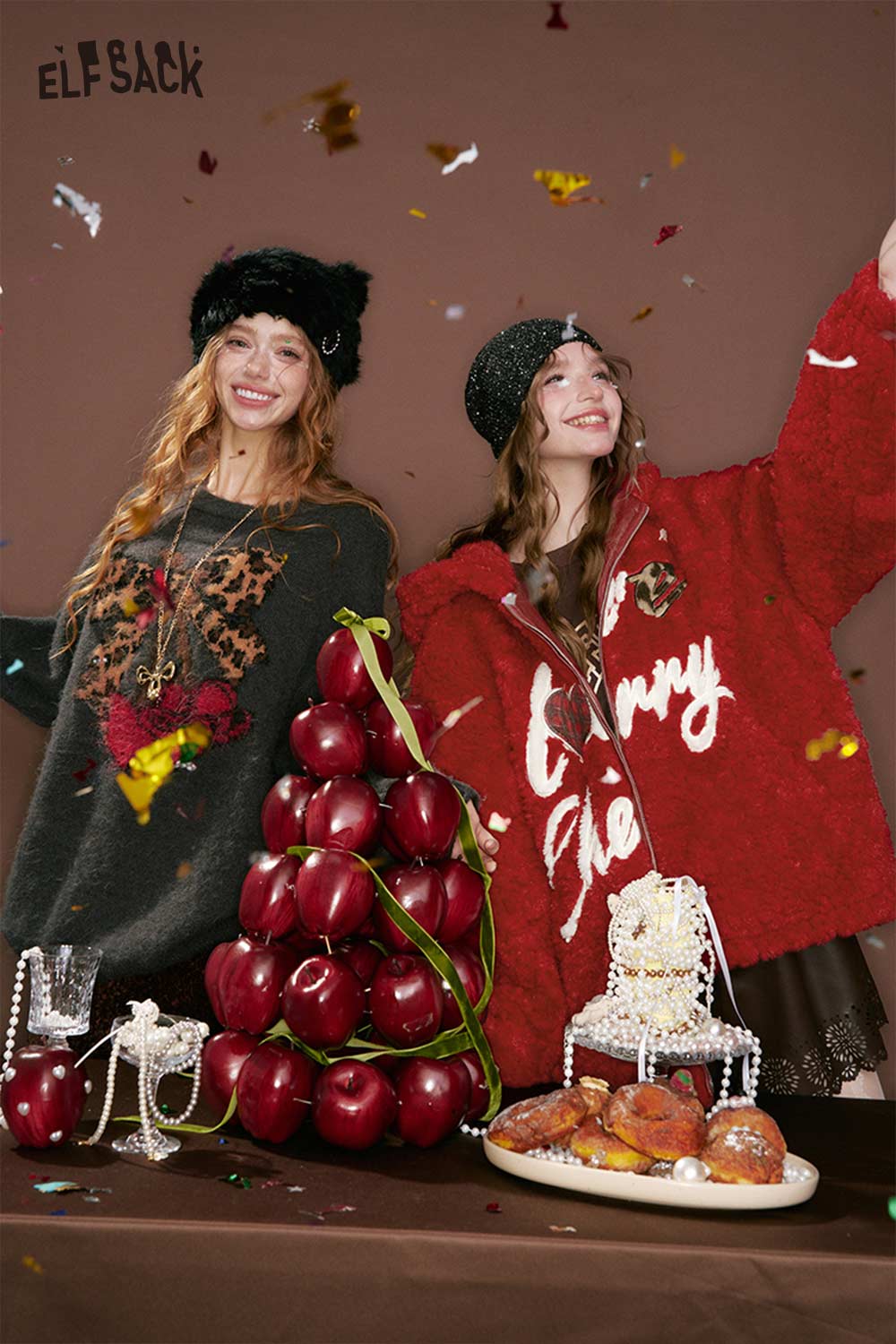 Two models wearing festive outfits with a cute heart embroidery faux wool jacket from ELFSACK