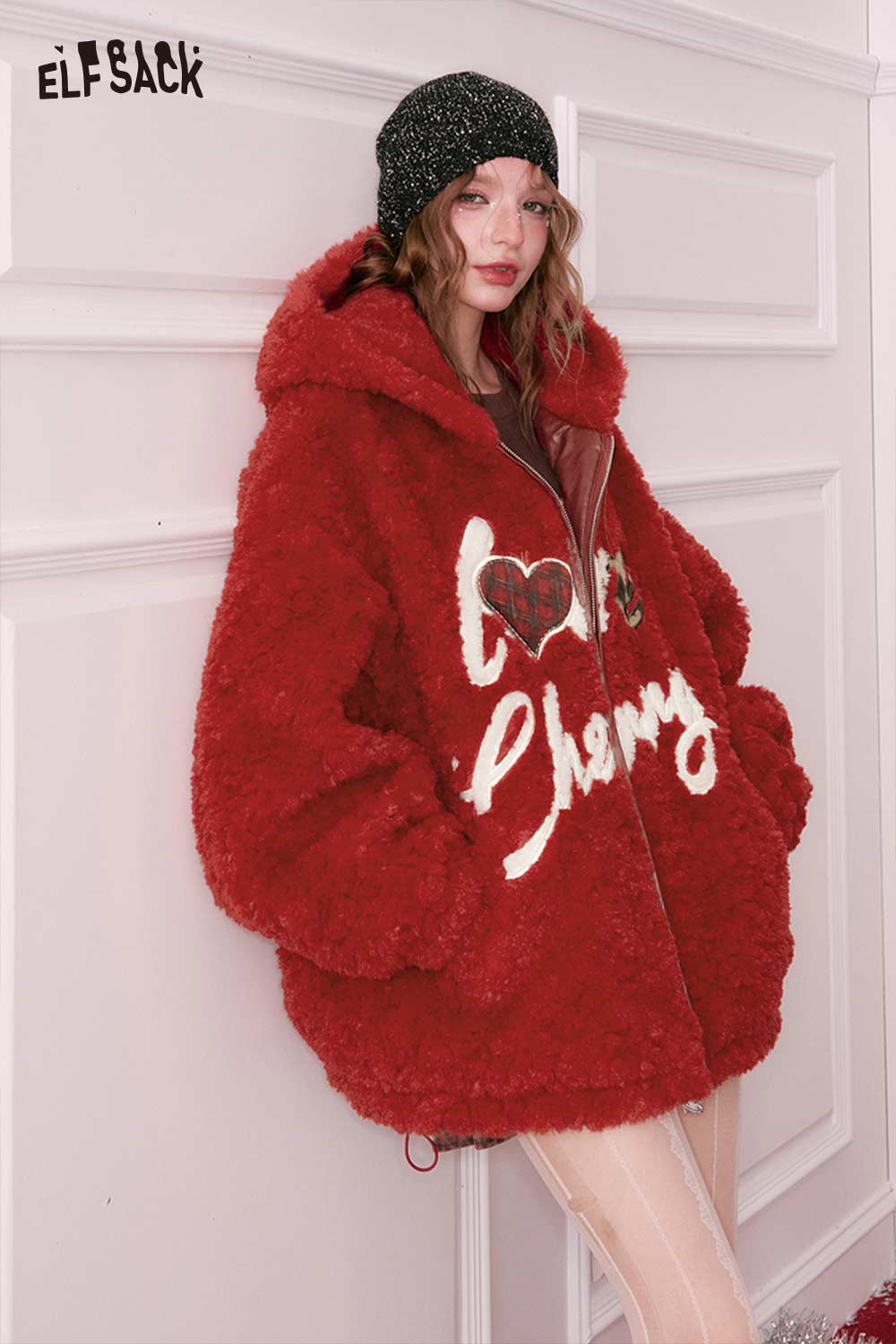 Cute heart embroidery faux wool jacket by ELFSACK in vibrant red, featuring a cozy oversized design.
