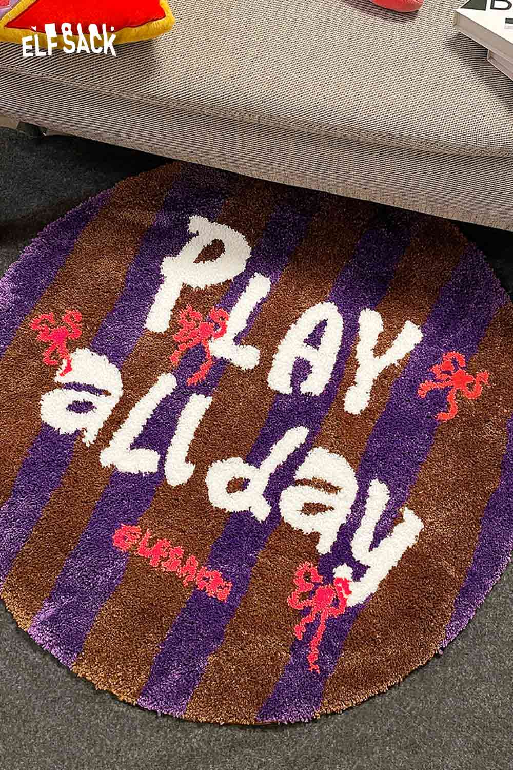 Cute round striped rug with playful text and vibrant colors for a fun home decor accent