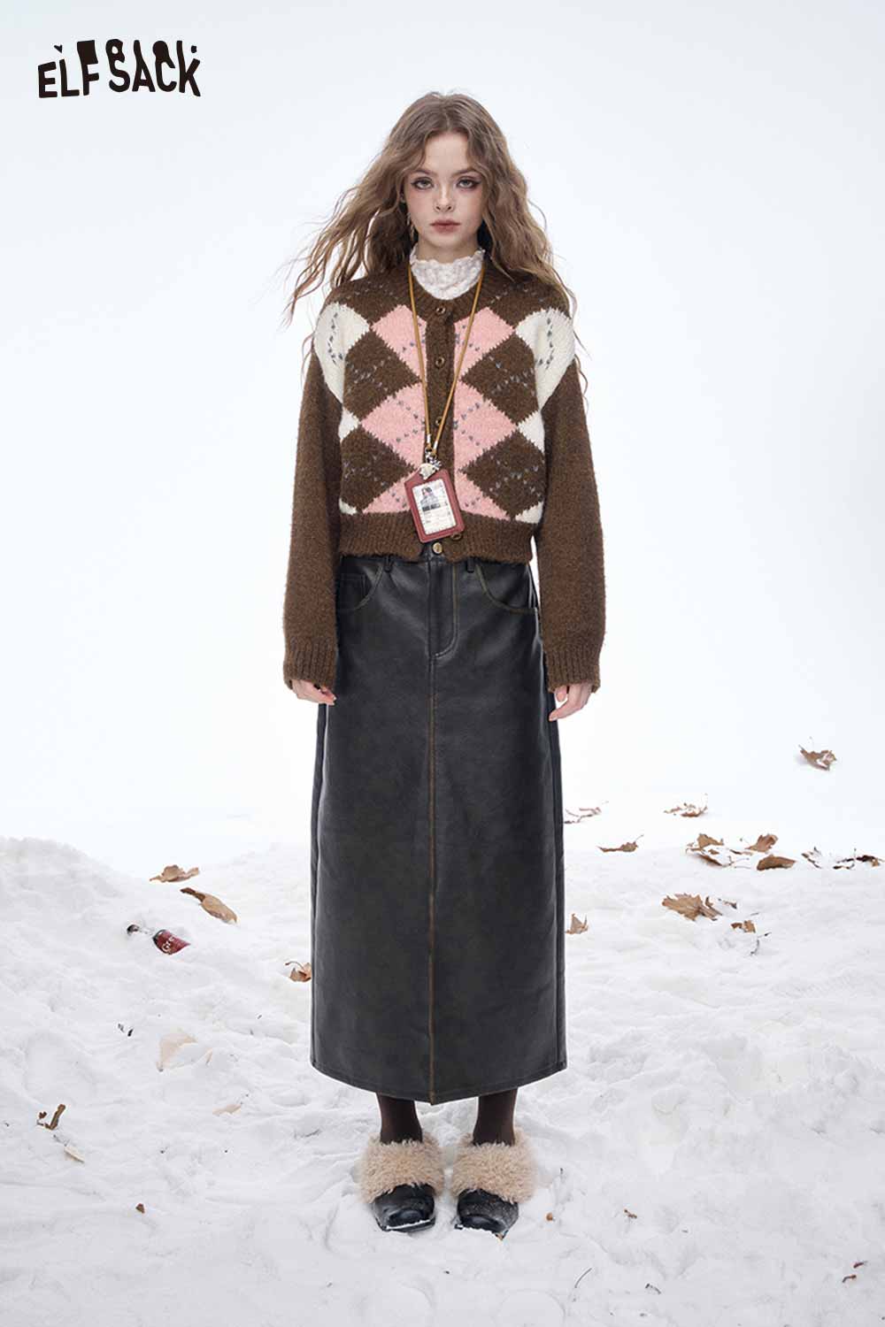 ELFSACK diamond graphic cropped sweater in brown with pink and white patterns, styled with a leather skirt