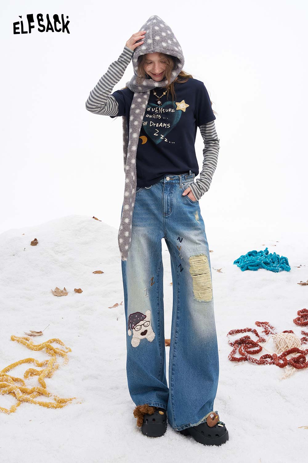 ELFSACK dog graphic distressed jeans featuring a relaxed fit and unique patches for a stylish look