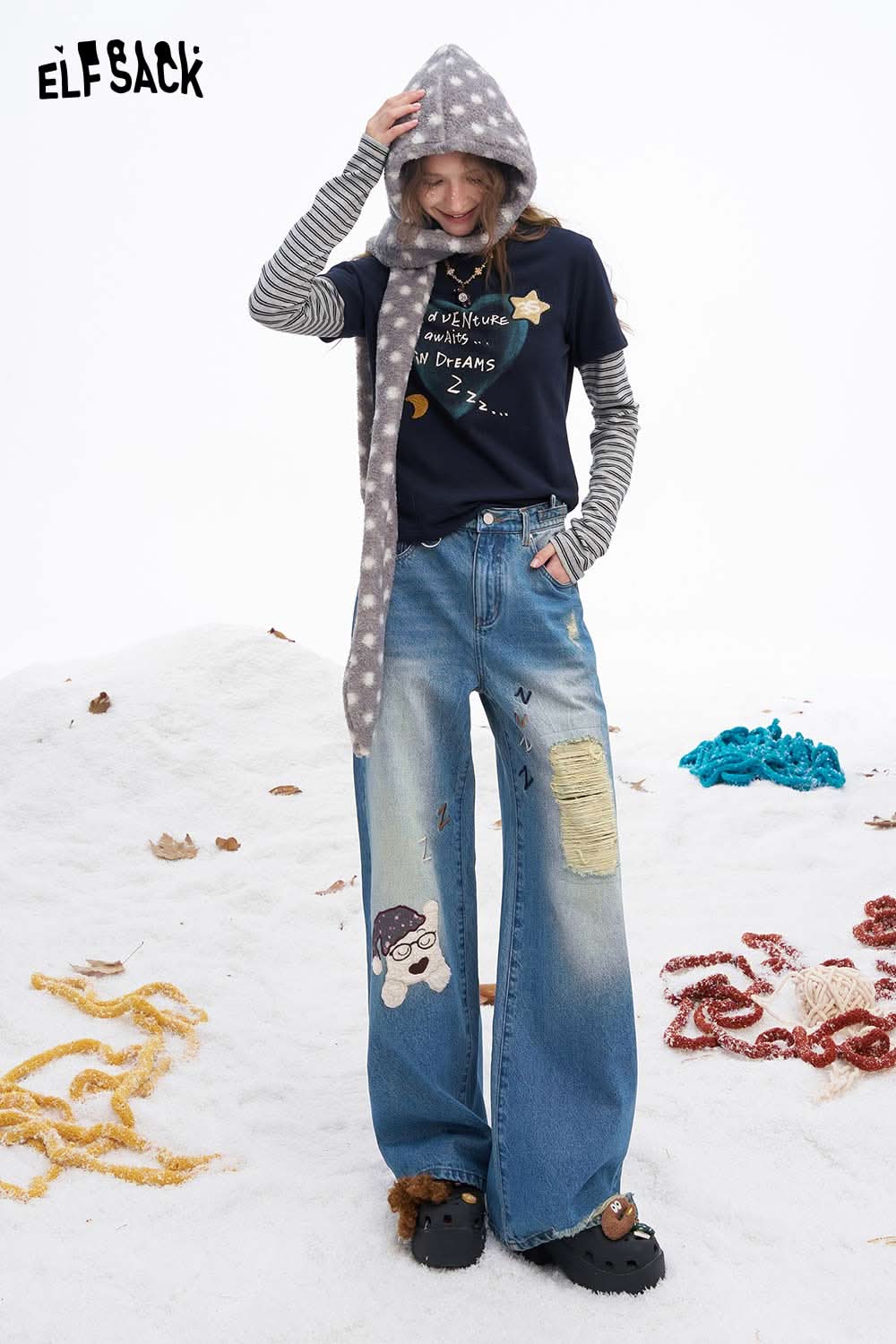 ELFSACK dog graphic distressed jeans featuring a relaxed fit and unique patches for a stylish look