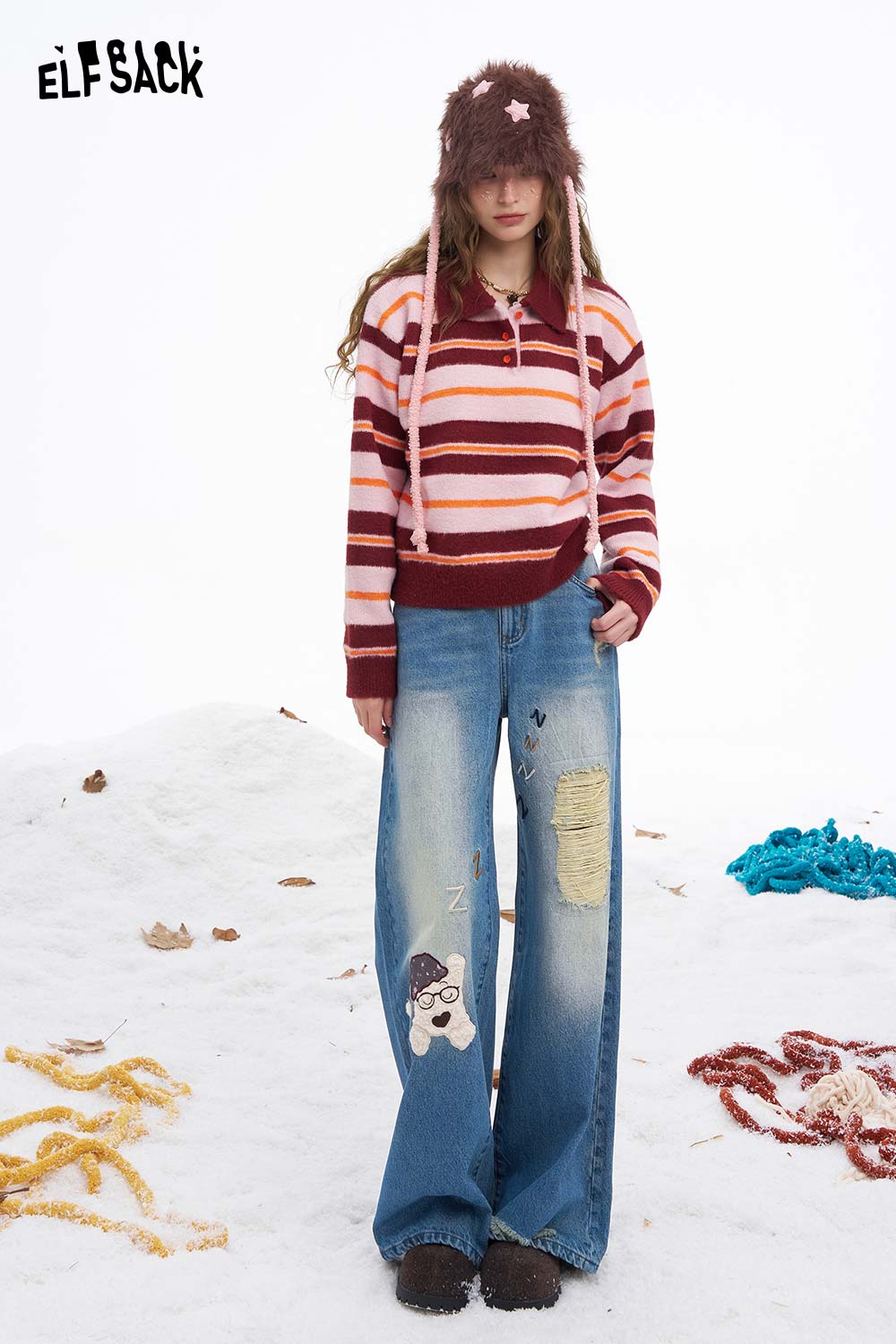 ELFSACK dog graphic distressed jeans featuring a playful design and relaxed fit for a trendy look