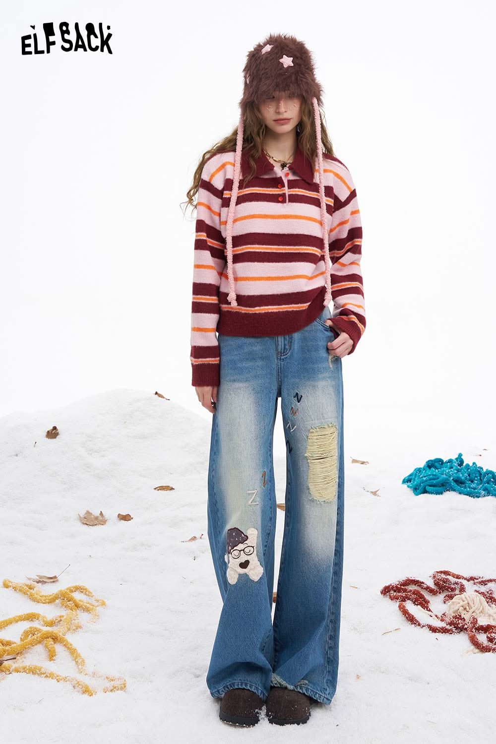 ELFSACK dog graphic distressed jeans featuring a playful design and relaxed fit for a trendy look