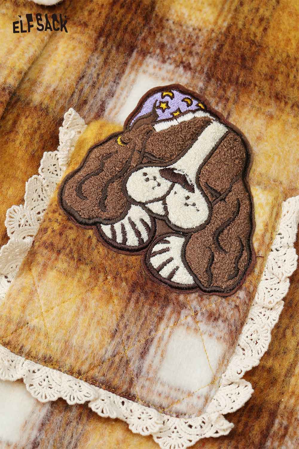 Close-up of ELFSACK dog graphic plaid coat for women featuring a cute dog embroidery detail