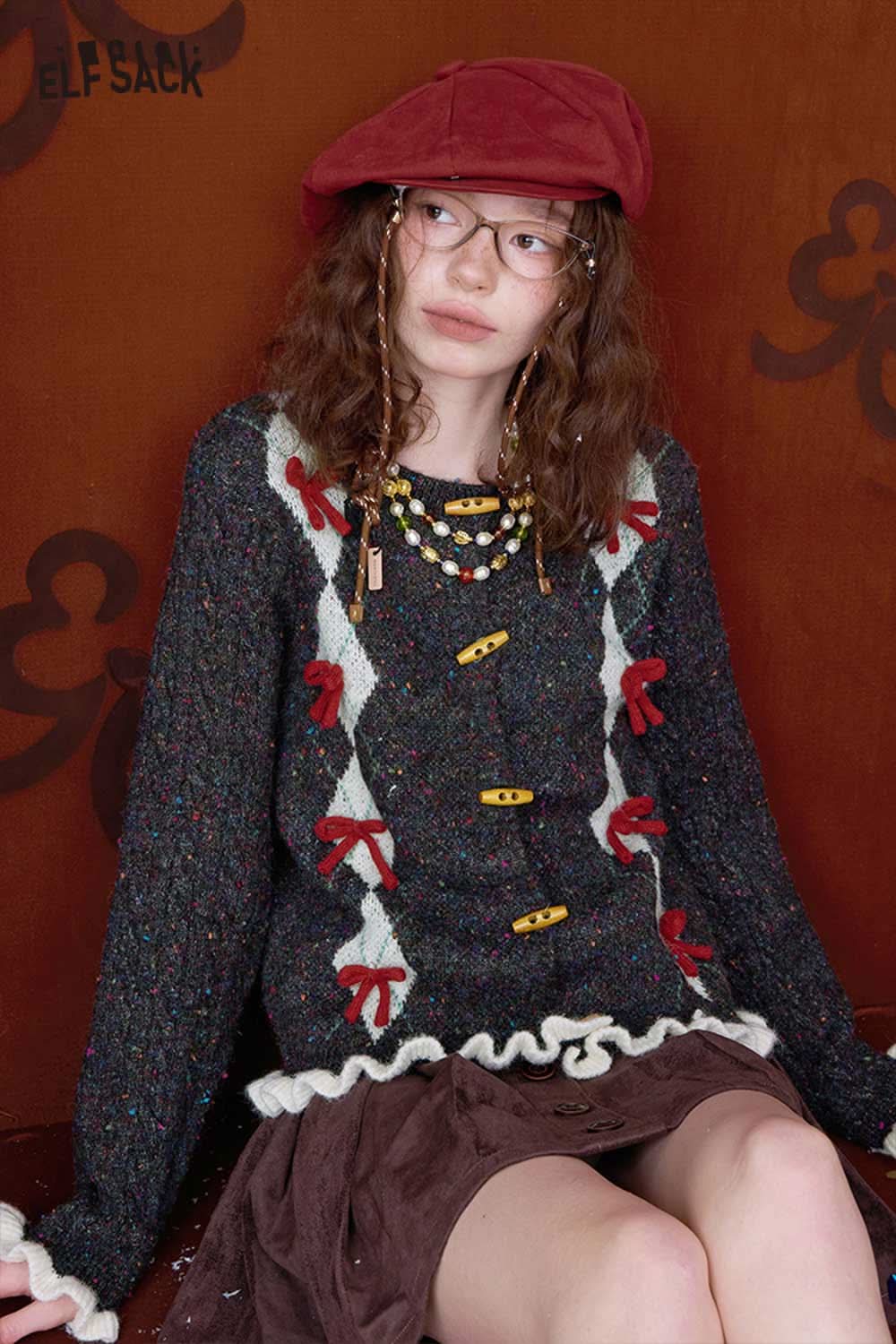 ELFSACK double breasted bow sweater featuring vibrant colors and decorative bows for a stylish look