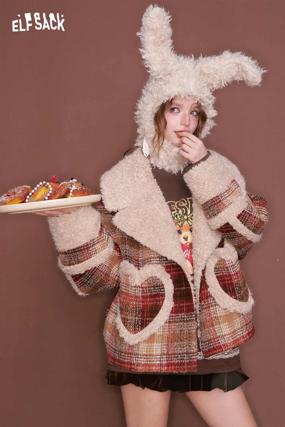 ELFSACK puppy graphic lace long sleeve tshirt worn with a cozy plaid coat and bunny hat