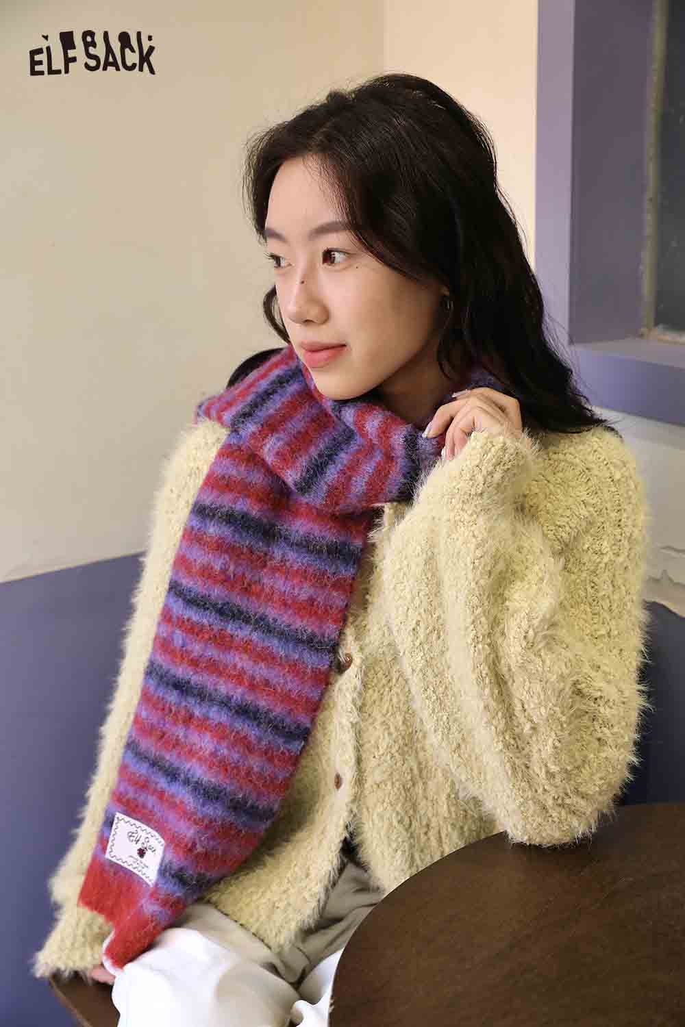 Cozy ELFSACK Christmas striped scarf for women in red and blue, perfect for winter style.