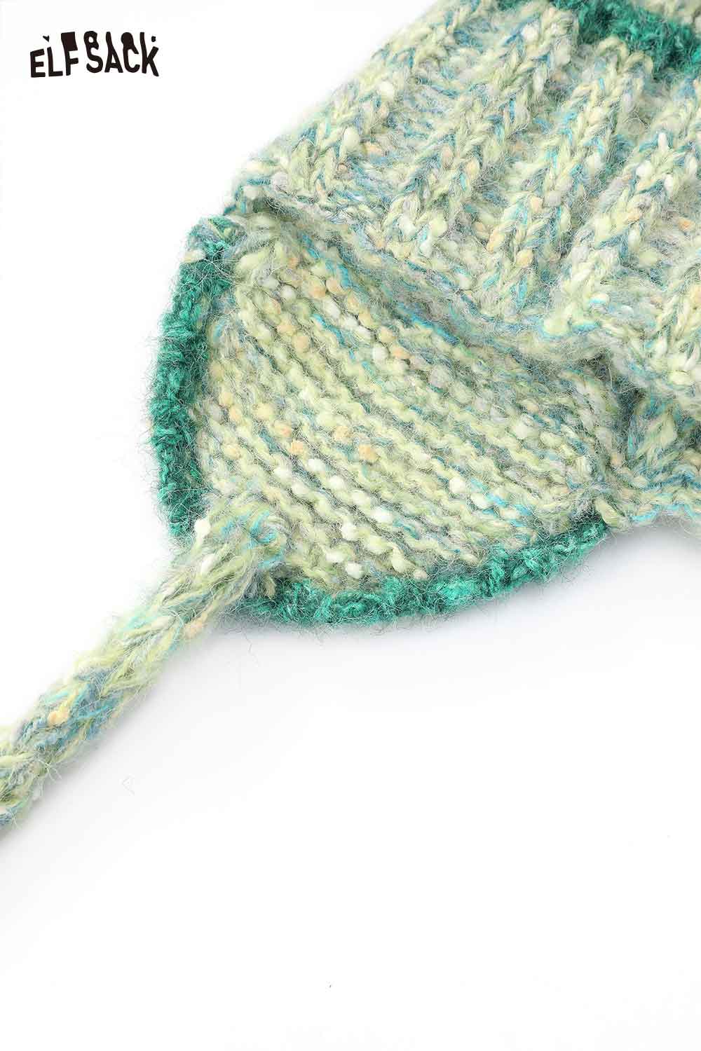Cute striped pom beanie for women in vibrant green hues with a cozy knit design