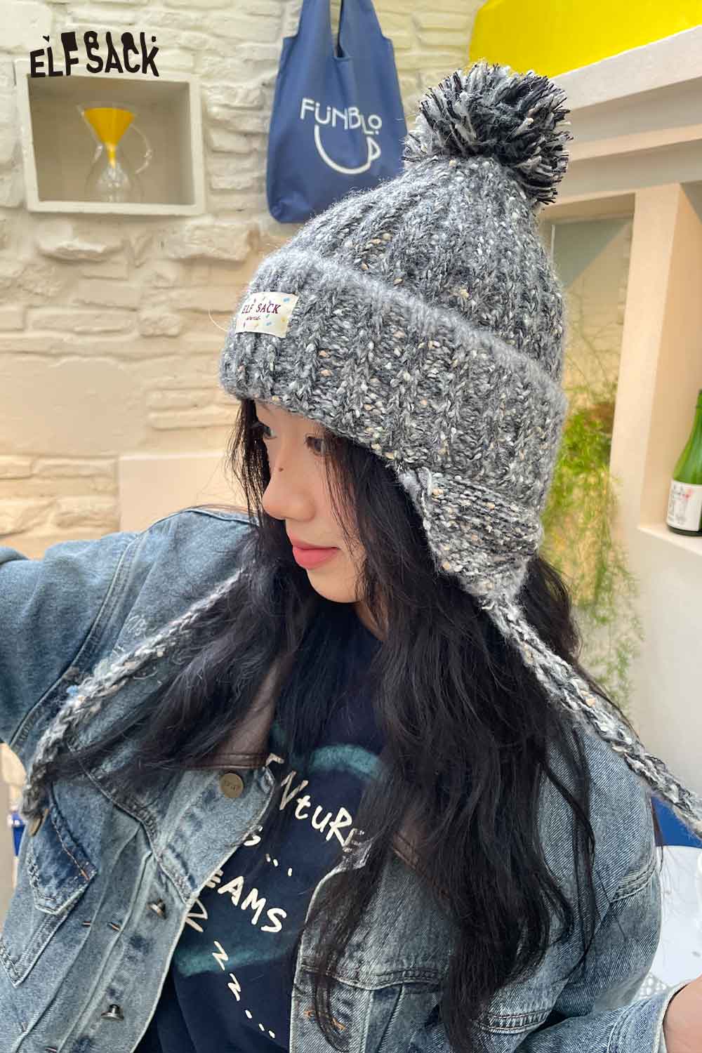 Stylish ELFSACK cute striped pom beanie for women with ear flaps and a cozy design