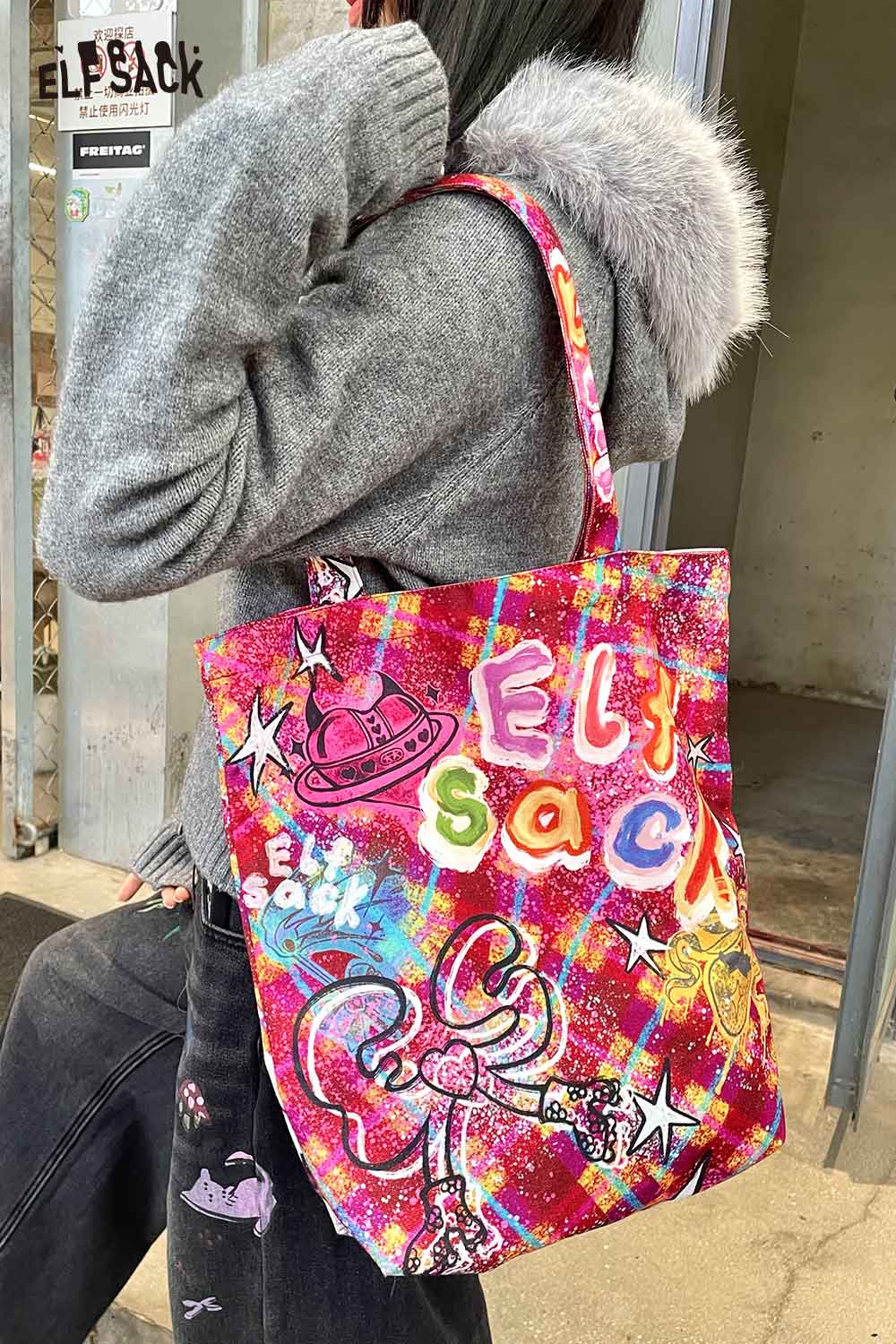Colorful ELFSACK plaid graffiti tote bag with fun designs, perfect for casual outings and everyday use