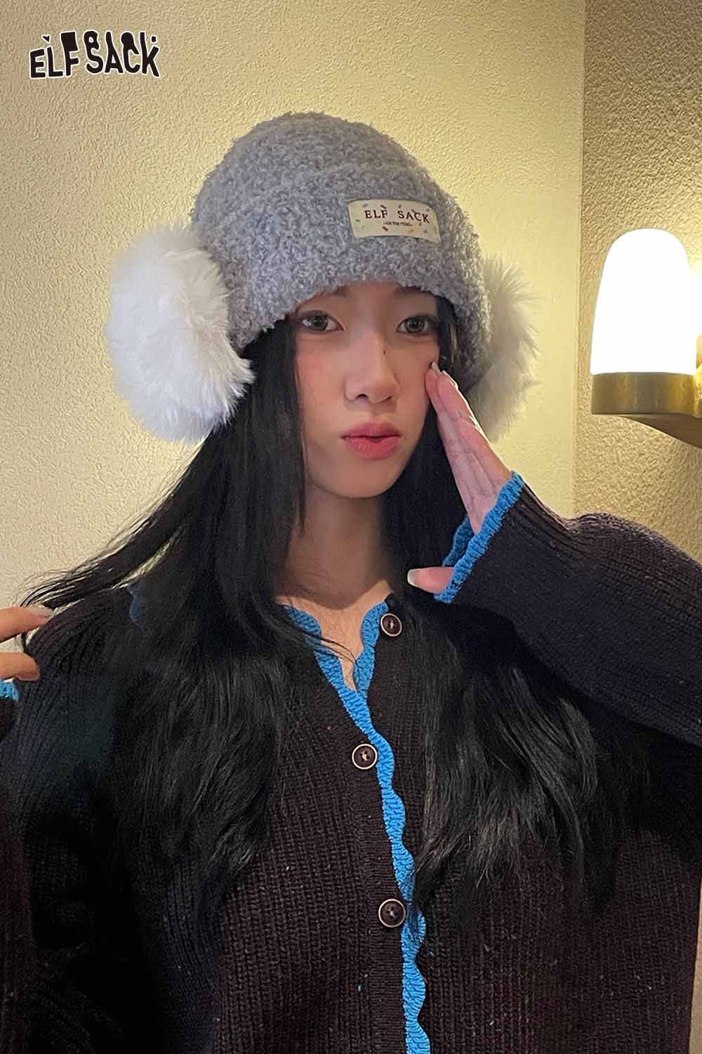 Stylish ELFSACK white plush ear muff beanie for cozy winter fashion with soft ears