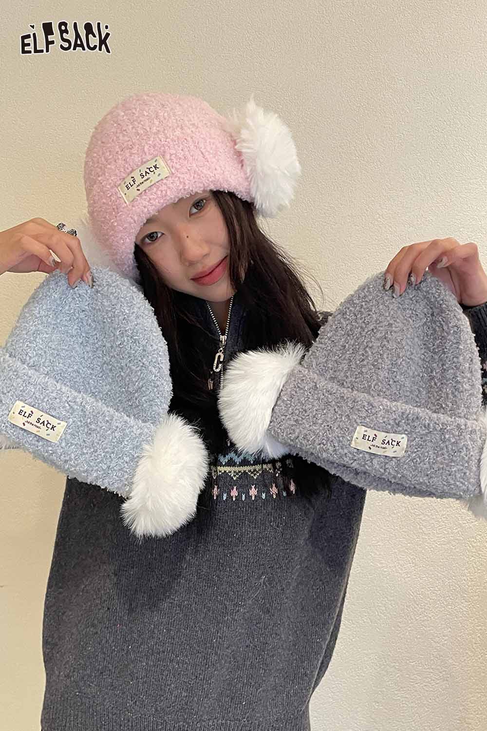 ELFSACK white plush ear muff beanie shown in pink and gray colors with pom poms for winter warmth