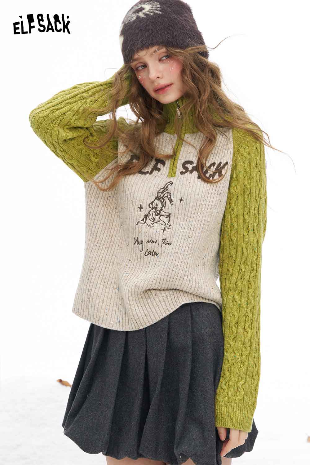 ELFSACK women's graphic color block knitwear featuring unique cable knit sleeves and playful design