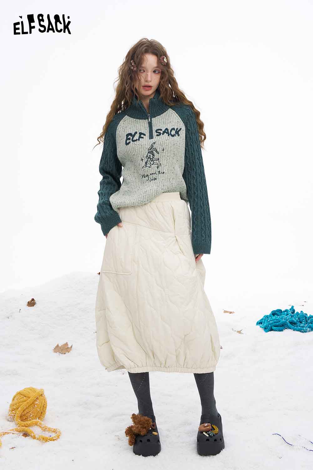 ELFSACK women's graphic color block knitwear with a stylish design, paired with a light skirt