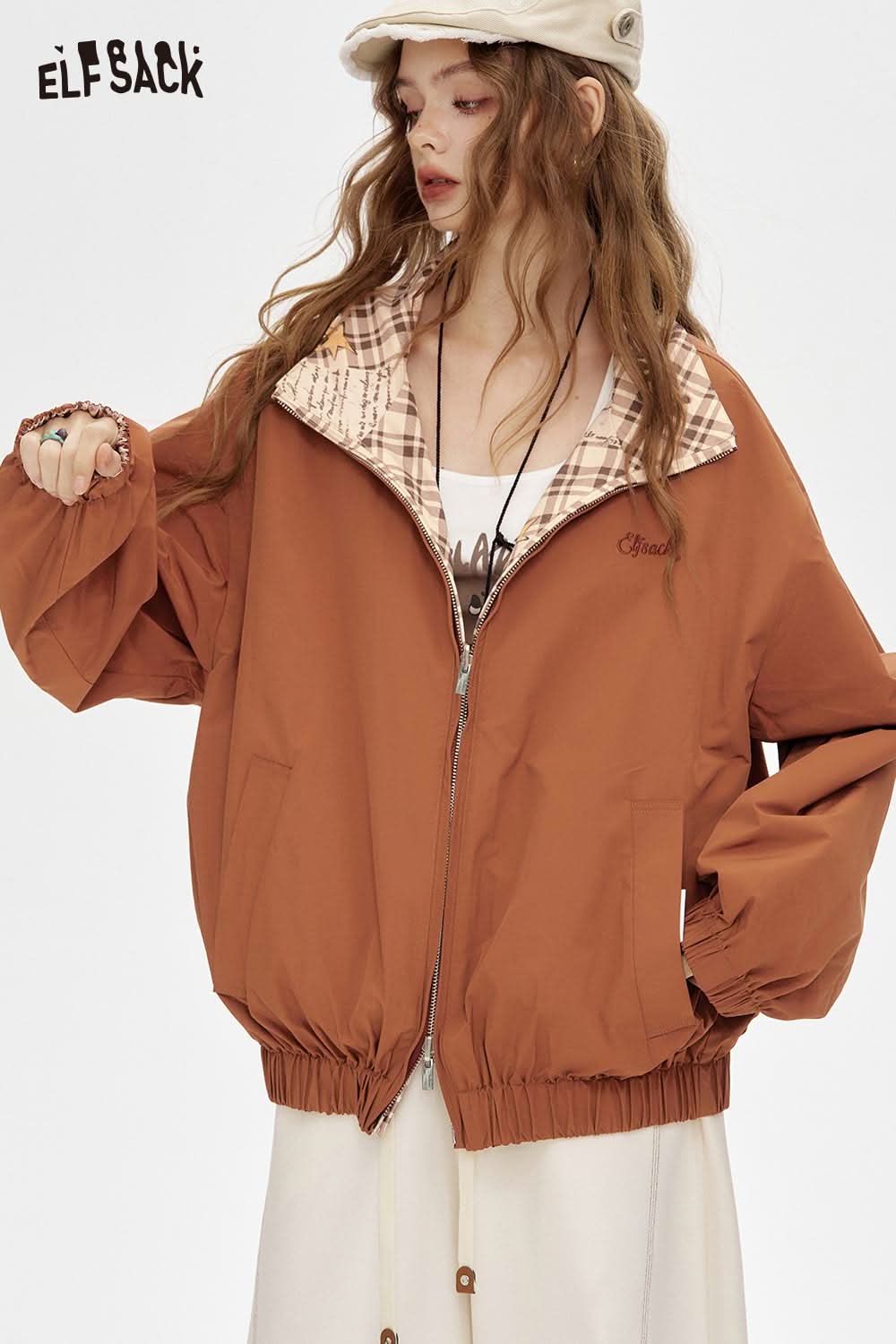ELFSACK breathable checkered graphic jacket for women in brown with oversized fit and stylish design