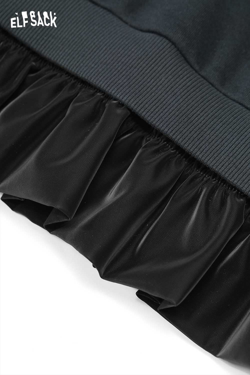 Close-up of ELFSACK cherry embroidery dress featuring a ruffled hem for a stylish look