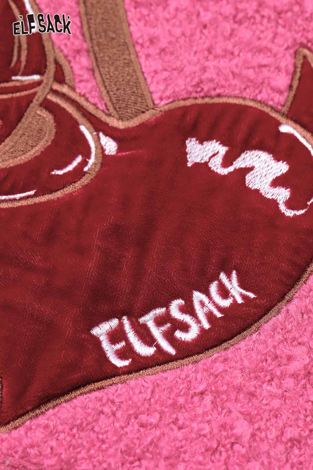 Close-up of ELFSACK cherry heart embroidery sweater featuring vibrant cherry heart design