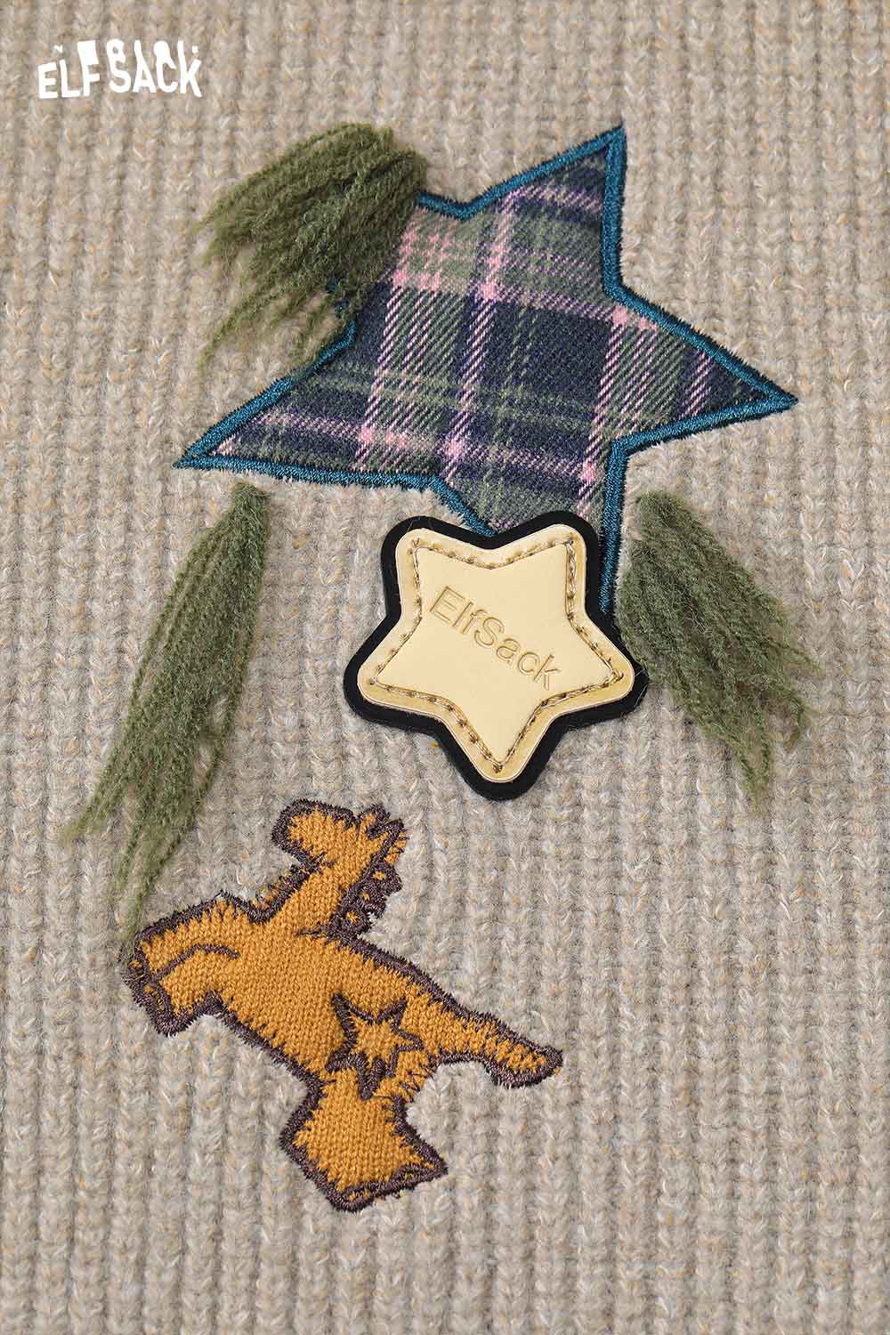 ELFSACK color block hooded dress featuring playful star and animal patches in vibrant colors