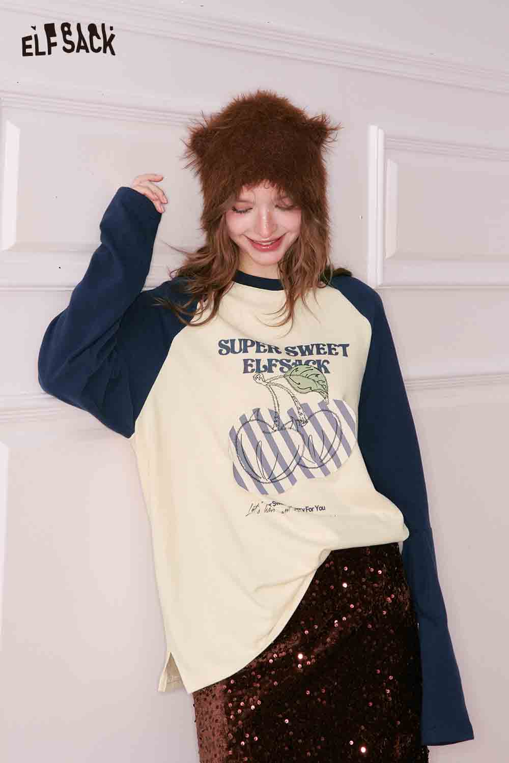 ELFSACK color block raglan sleeve tshirt in cream and navy with a playful graphic design