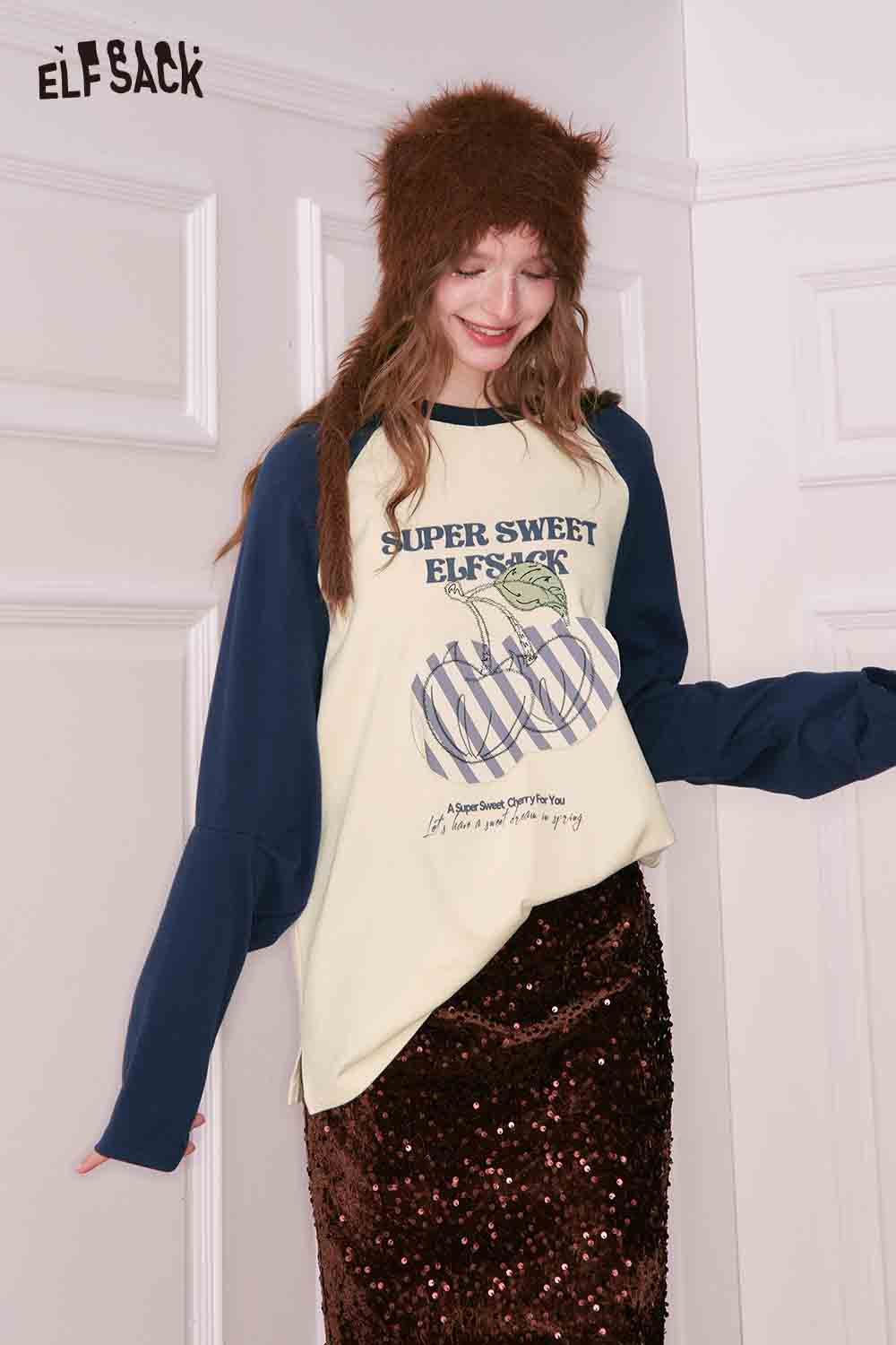 ELFSACK color block raglan sleeve tshirt featuring playful design and long sleeves for a chic look