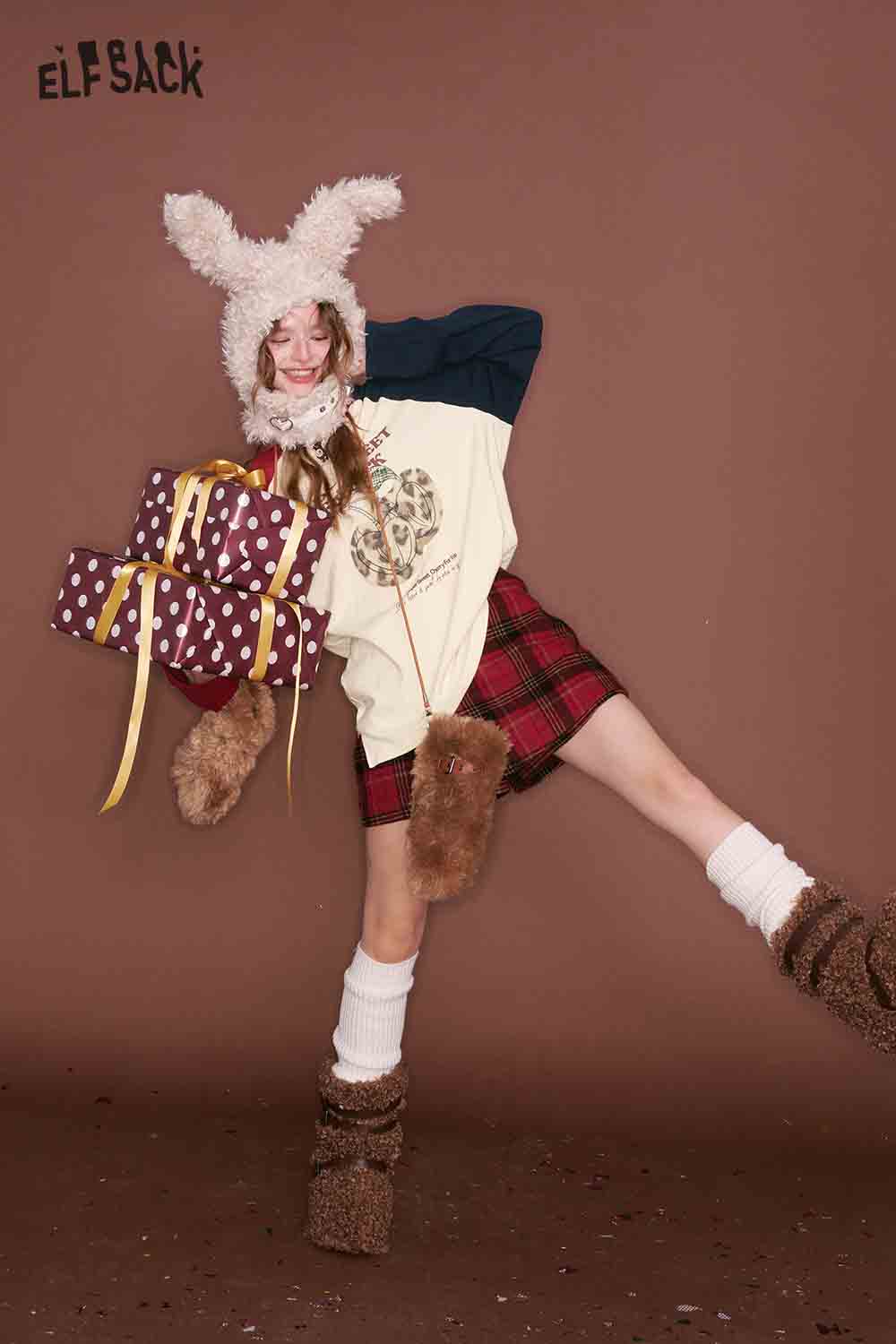 ELFSACK color block raglan sleeve tshirt styled with a playful outfit and festive gifts