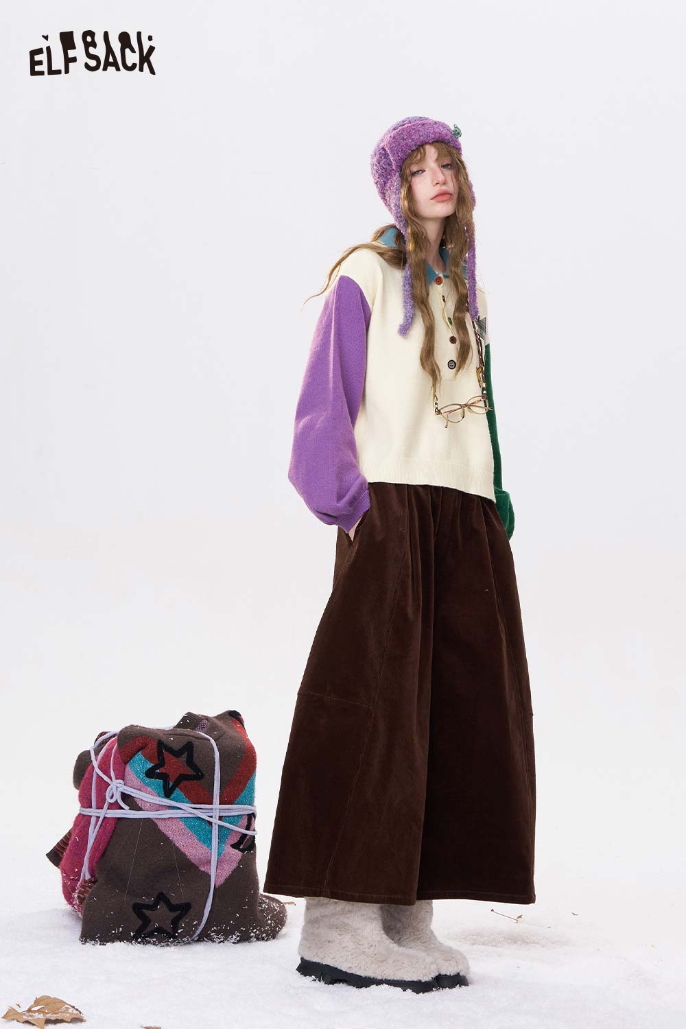 ELFSACK cute graphic polo neck sweater styled with wide brown pants and a colorful beanie