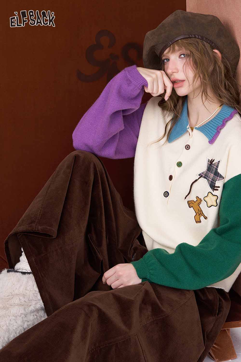 ELFSACK cute graphic polo neck sweater with colorful sleeves and playful design for a stylish look