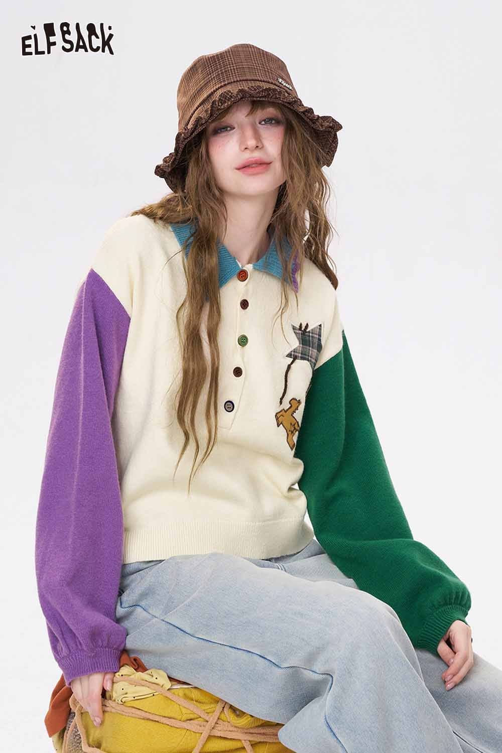 Cute graphic polo neck sweater by ELFSACK in cream with colorful sleeves and playful design