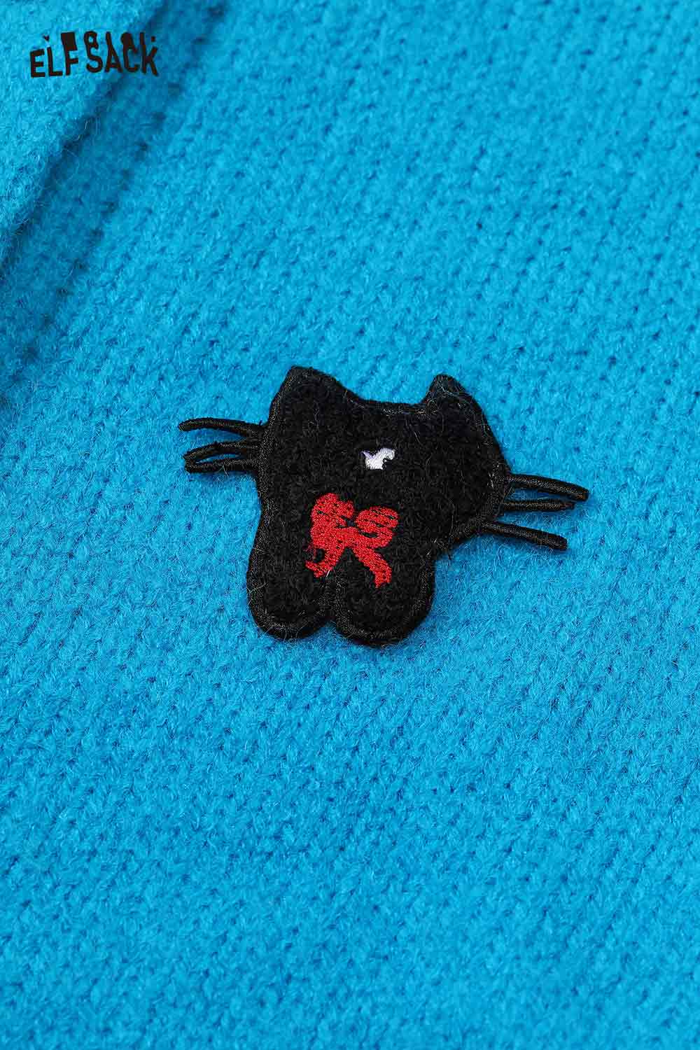 Cute knit embroidered sweater for women featuring a playful cat patch detail in vibrant blue