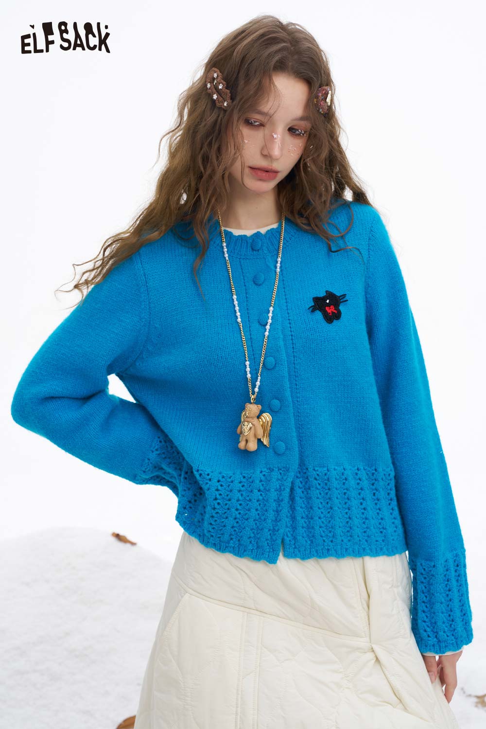 Cute knit embroidered sweater for women in vibrant blue with decorative buttons from ELFSACK
