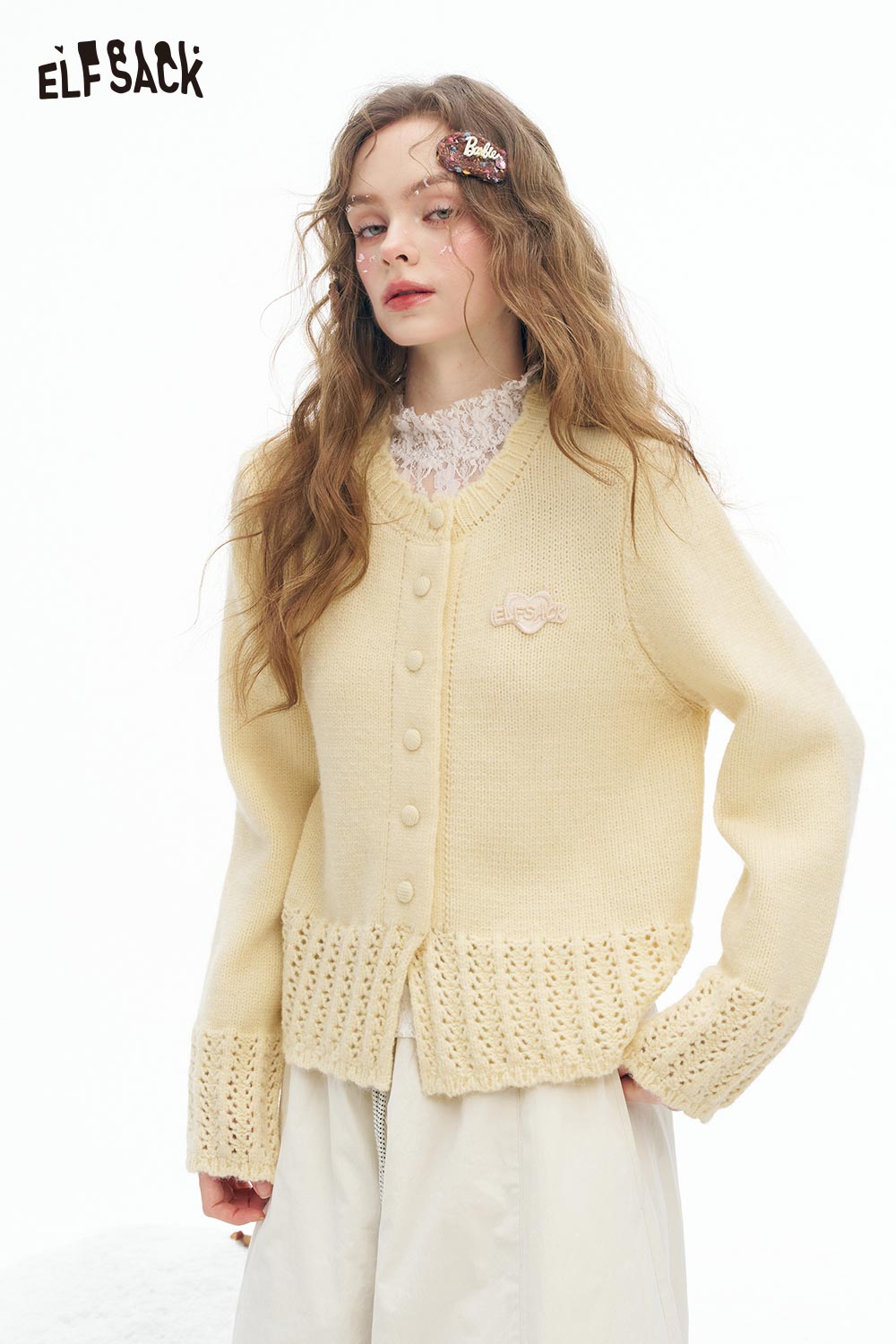Cute knit embroidered sweater for women by ELFSACK in soft yellow, featuring button closure and lace details