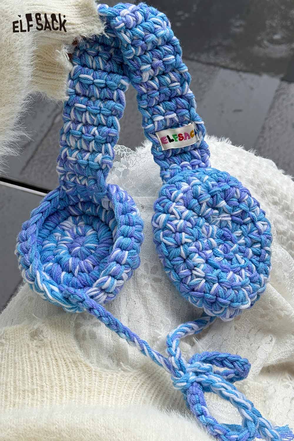 ELFSACK hand-knitted ear warmers in blue and purple shades for cozy winter style